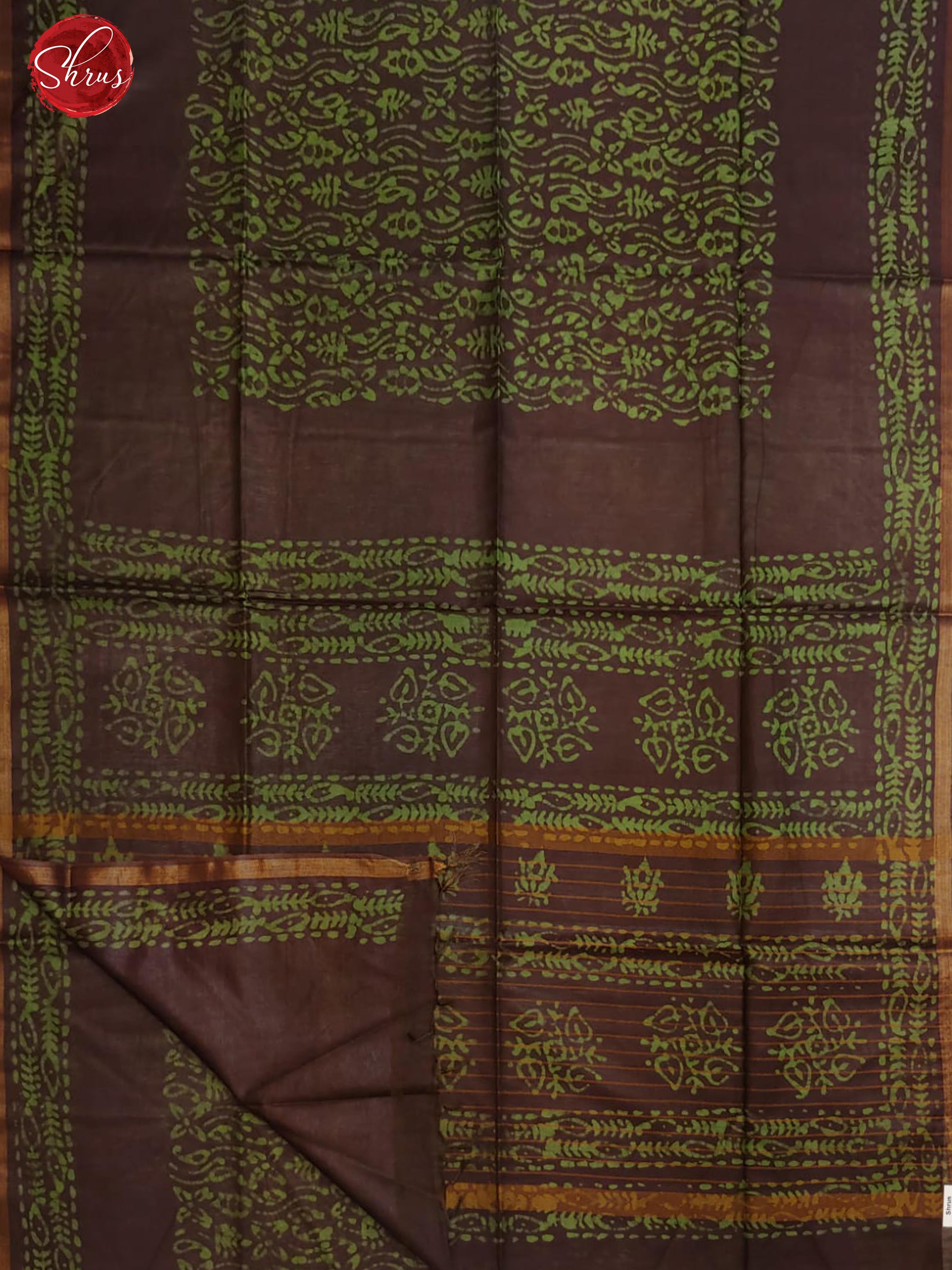Brown &  Green - Bhatik  with floral pattern on the body &  zari   Border - Shop on ShrusEternity.com