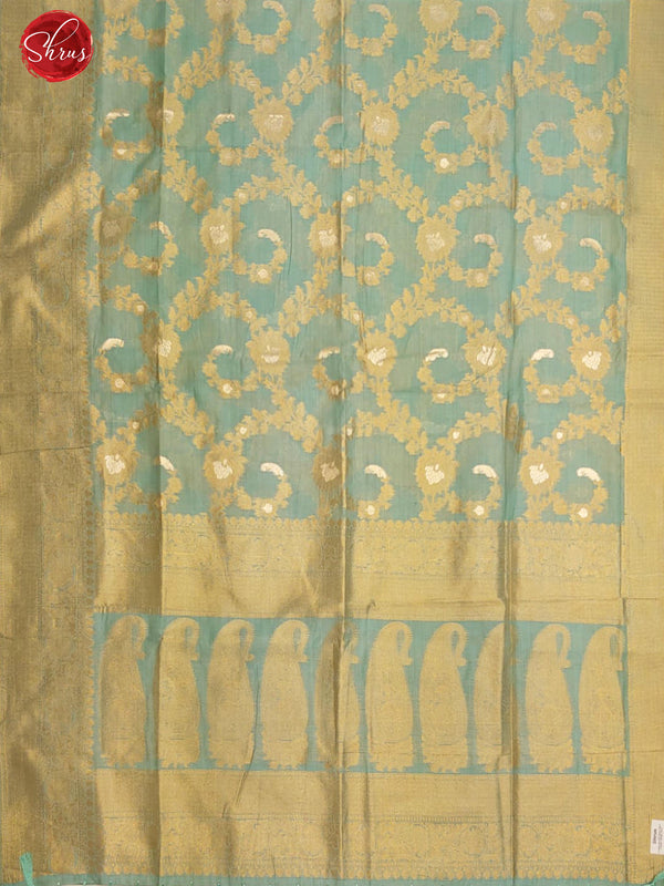 Teal Blue(Single Tone) - Semi Banarasi with zari woven  floral brocade    on the body& Zari Border - Shop on ShrusEternity.com