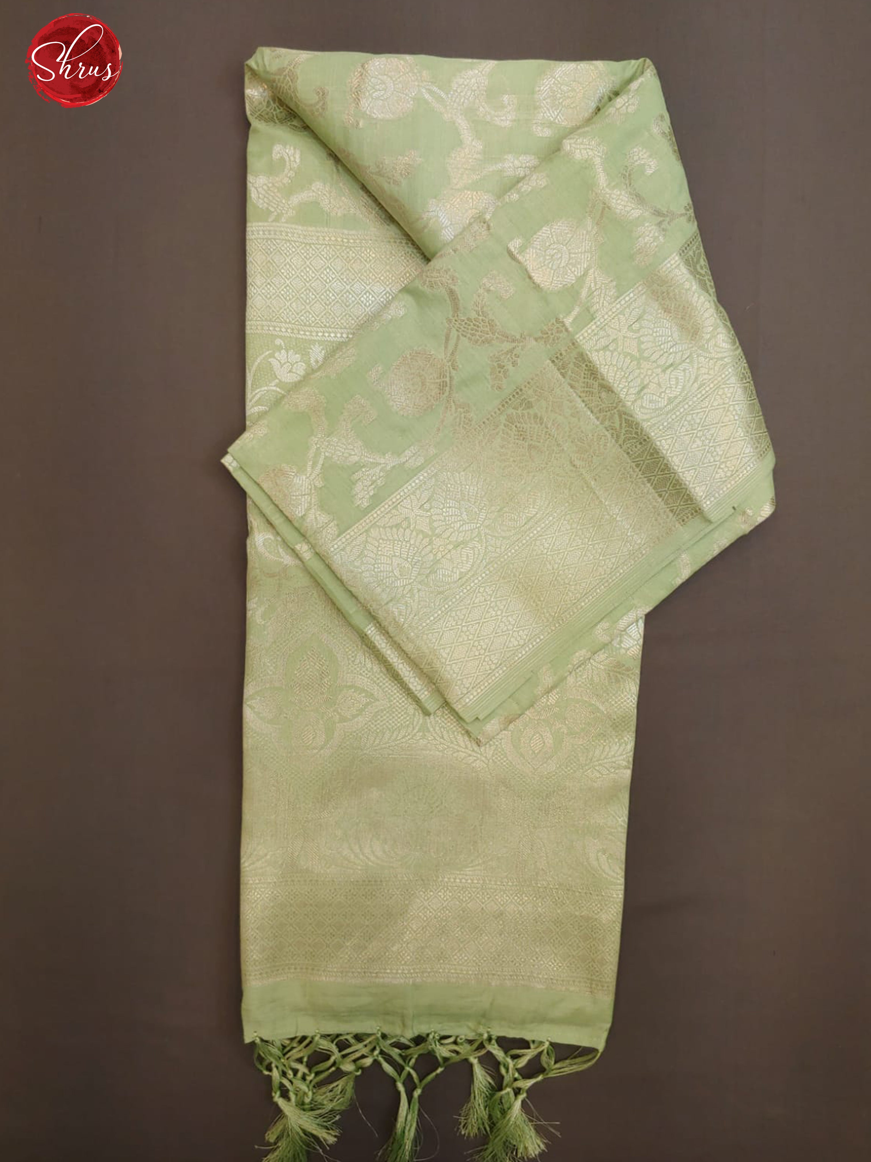 Pastel Green(Single Tone) - Semi Banarasi with zari woven diagonal  floral vines ,buttas   on the body& Zari Border - Shop on ShrusEternity.com