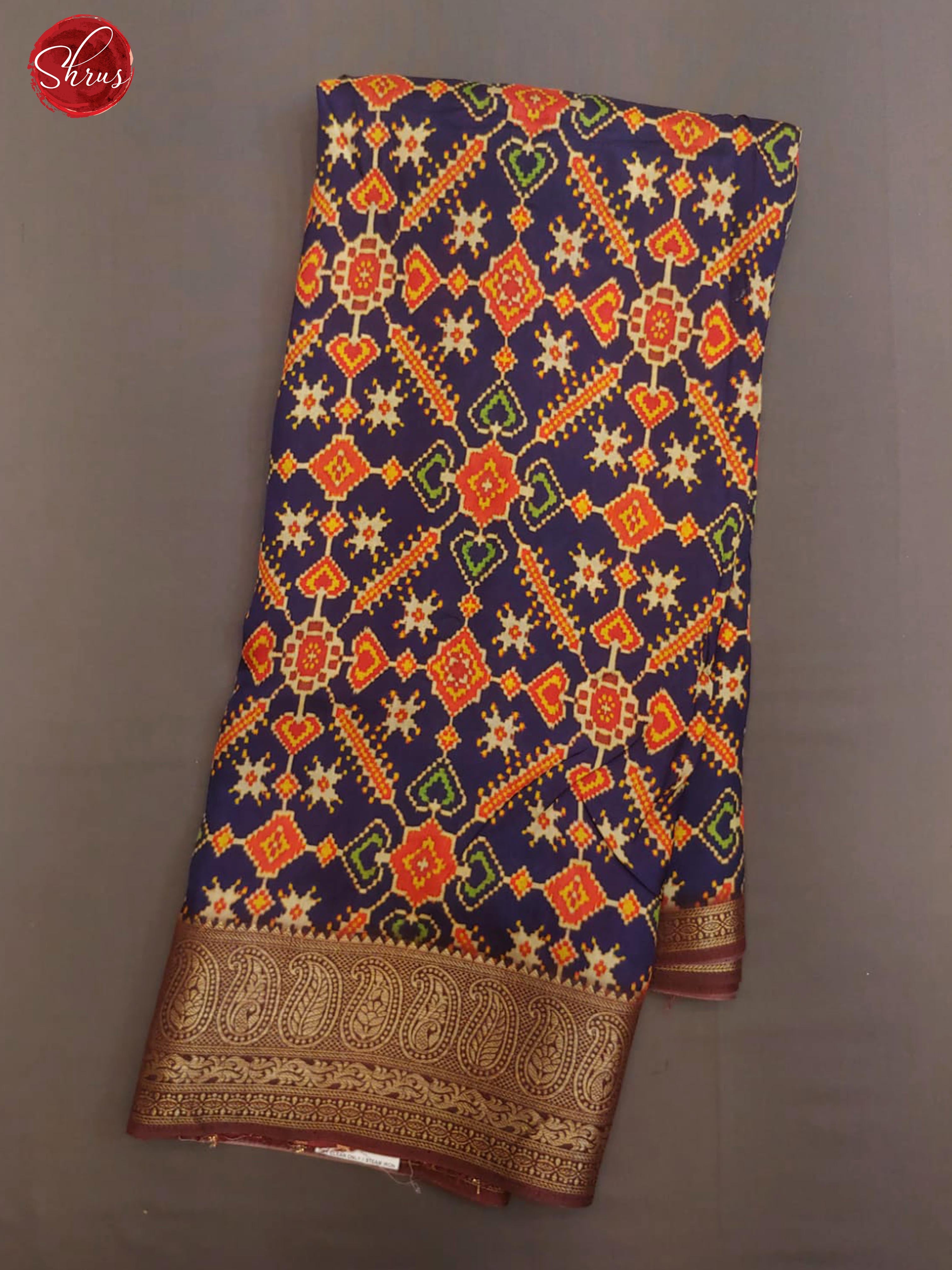Blue & Maroon - Semi Crepe with patola floral print on the body & Zari Border - Shop on ShrusEternity.com