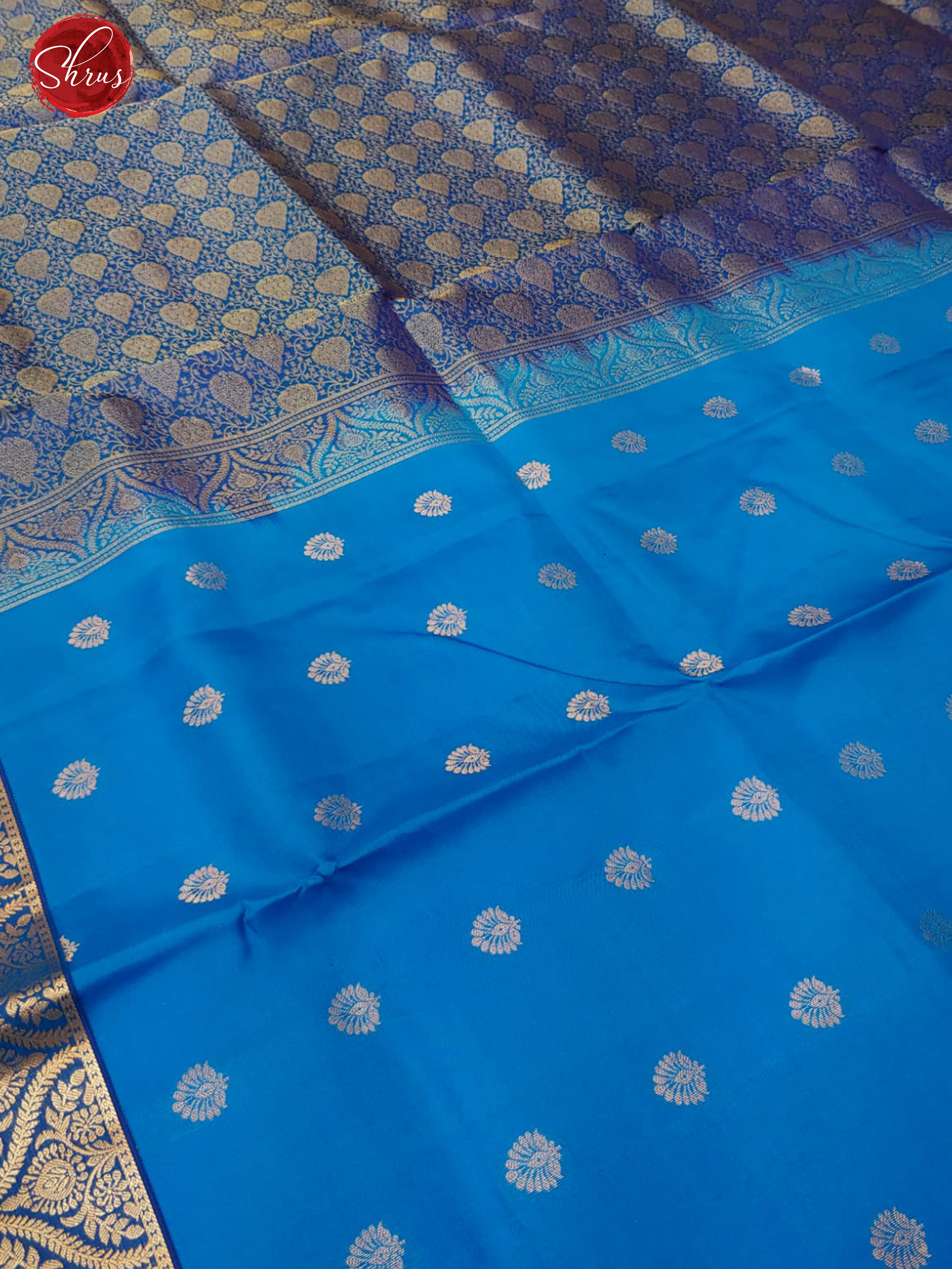 Blue & Peacock Blue - Kanchipuram Silk with zari woven floral buttas on the body & zari Border - Shop on ShrusEternity.com