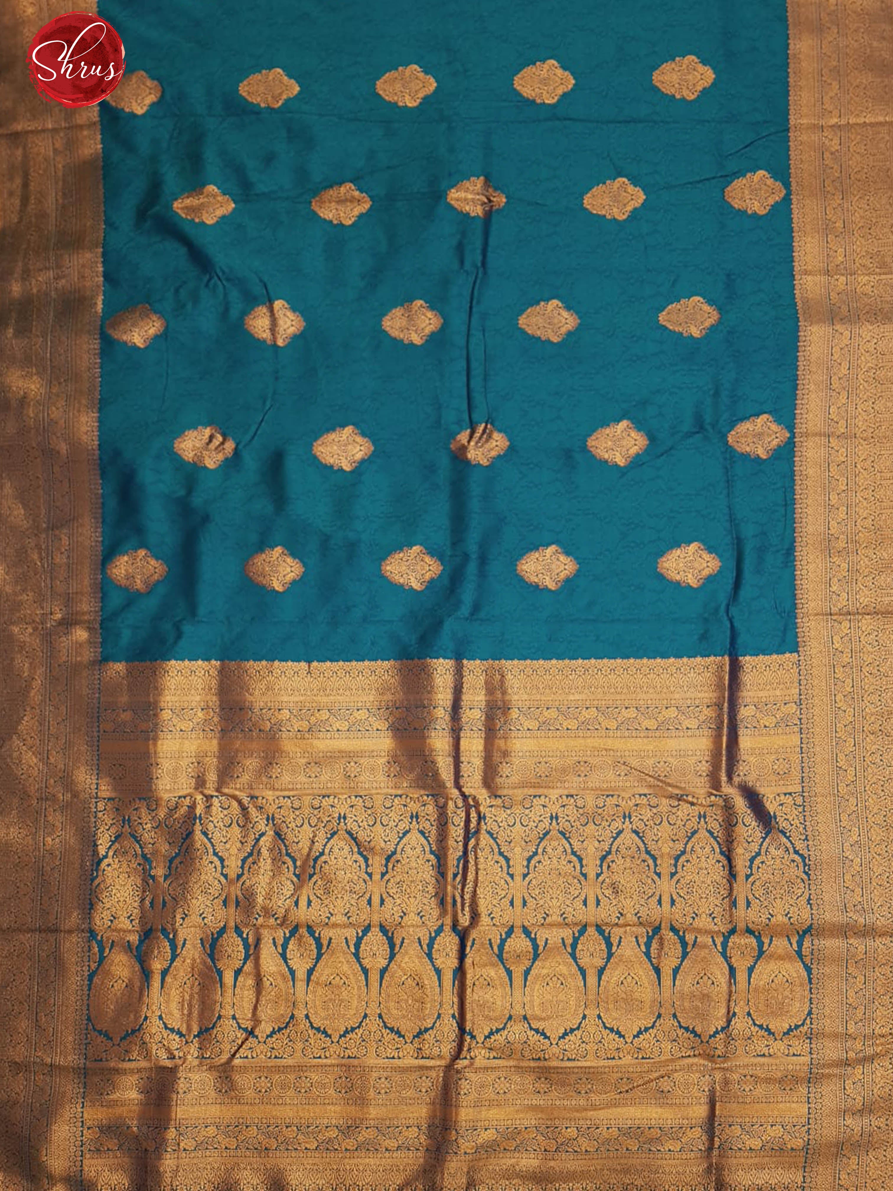 Blue (Single Tone)- Semi Kanchipuram with  Zari woven  floral motifs  on the body & Contrast Zari Border - Shop on ShrusEternity.com