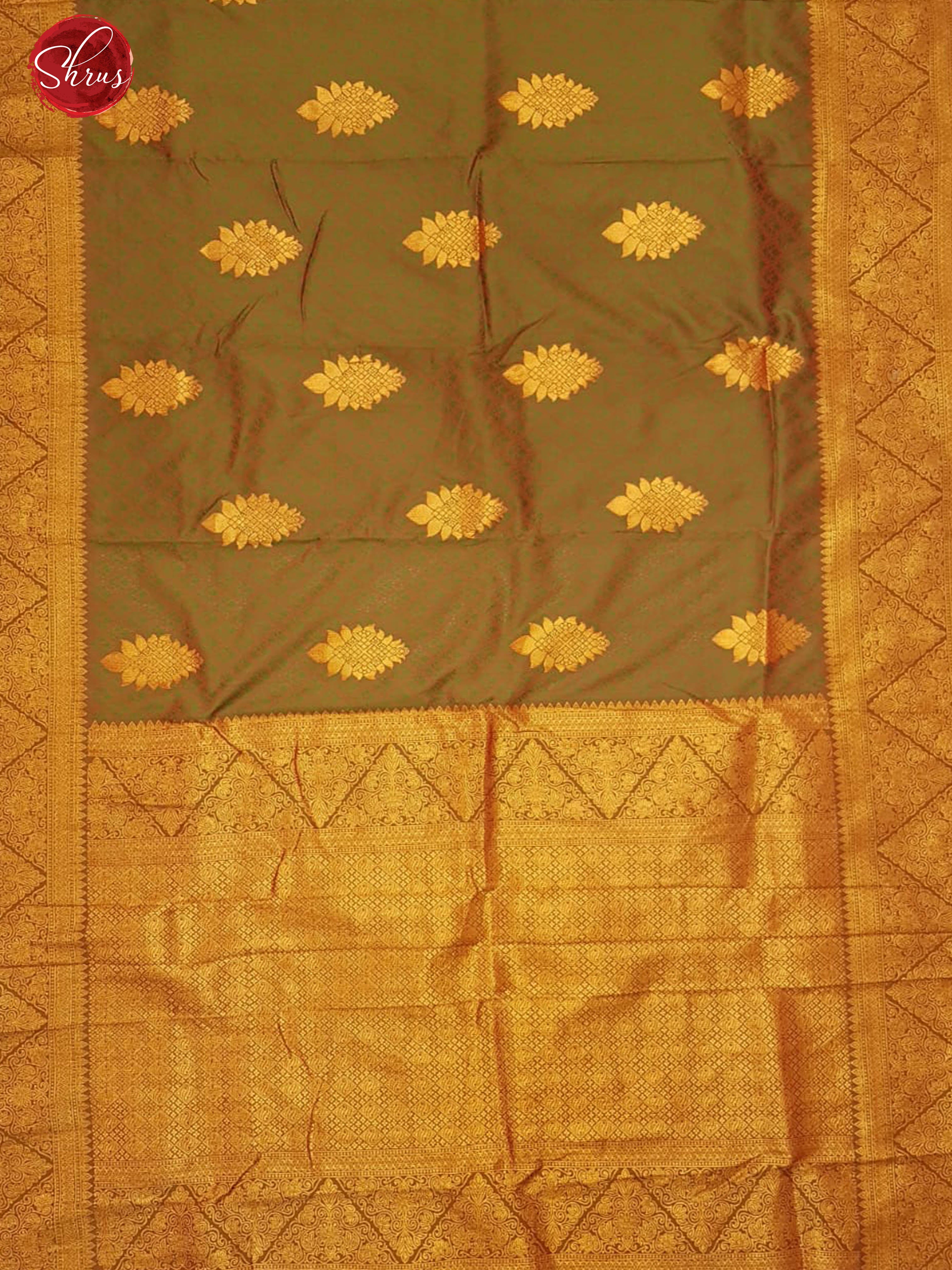 Green & Brown - Semi Kanchipuram with Zari woven  floral motifs   on the body & Contrast Zari Border - Shop on ShrusEternity.com
