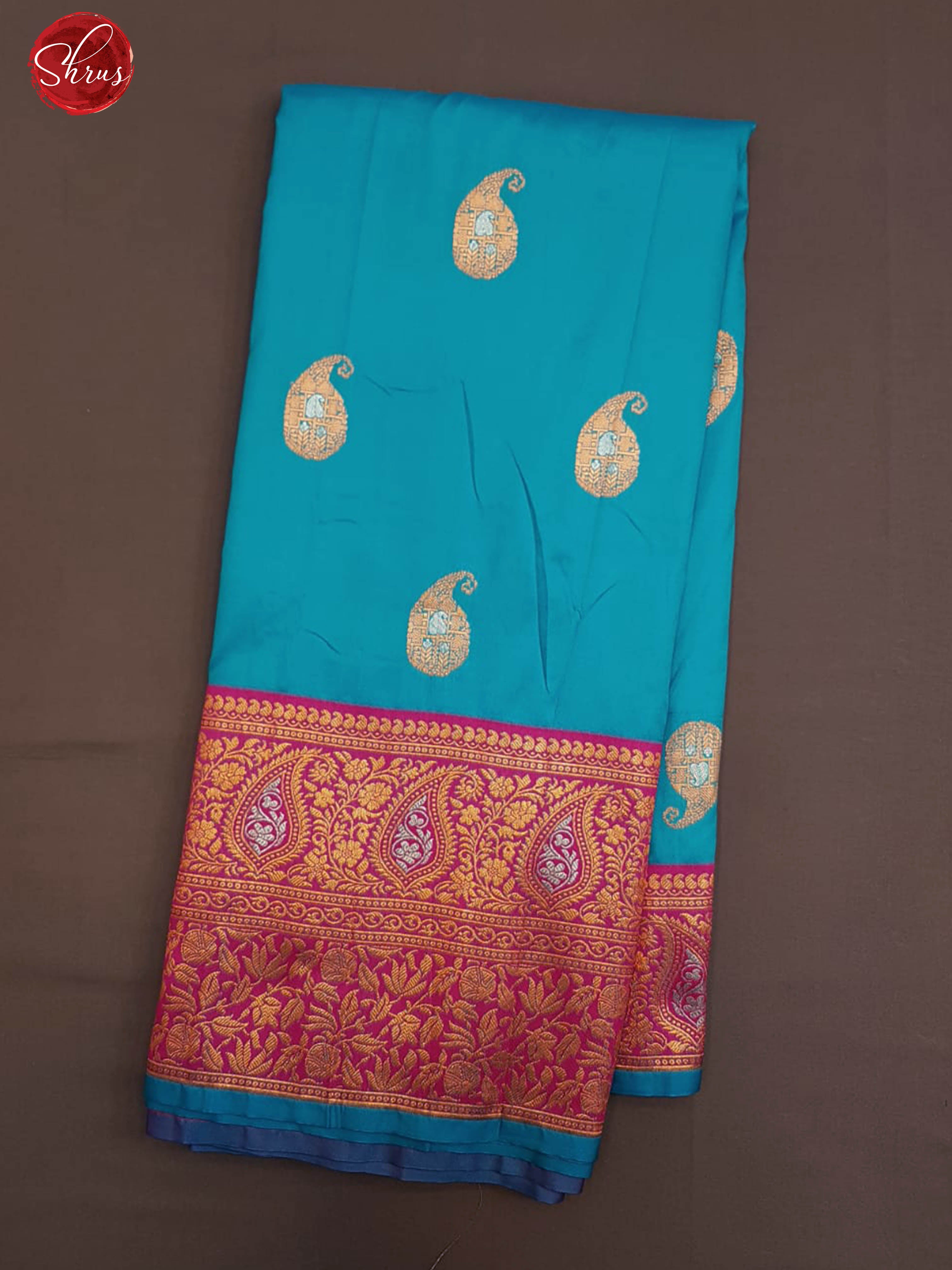 Blue & Pink - Semi Kanchipuram with Zari woven manga buttas  on the body & Contrast Zari Border - Shop on ShrusEternity.com