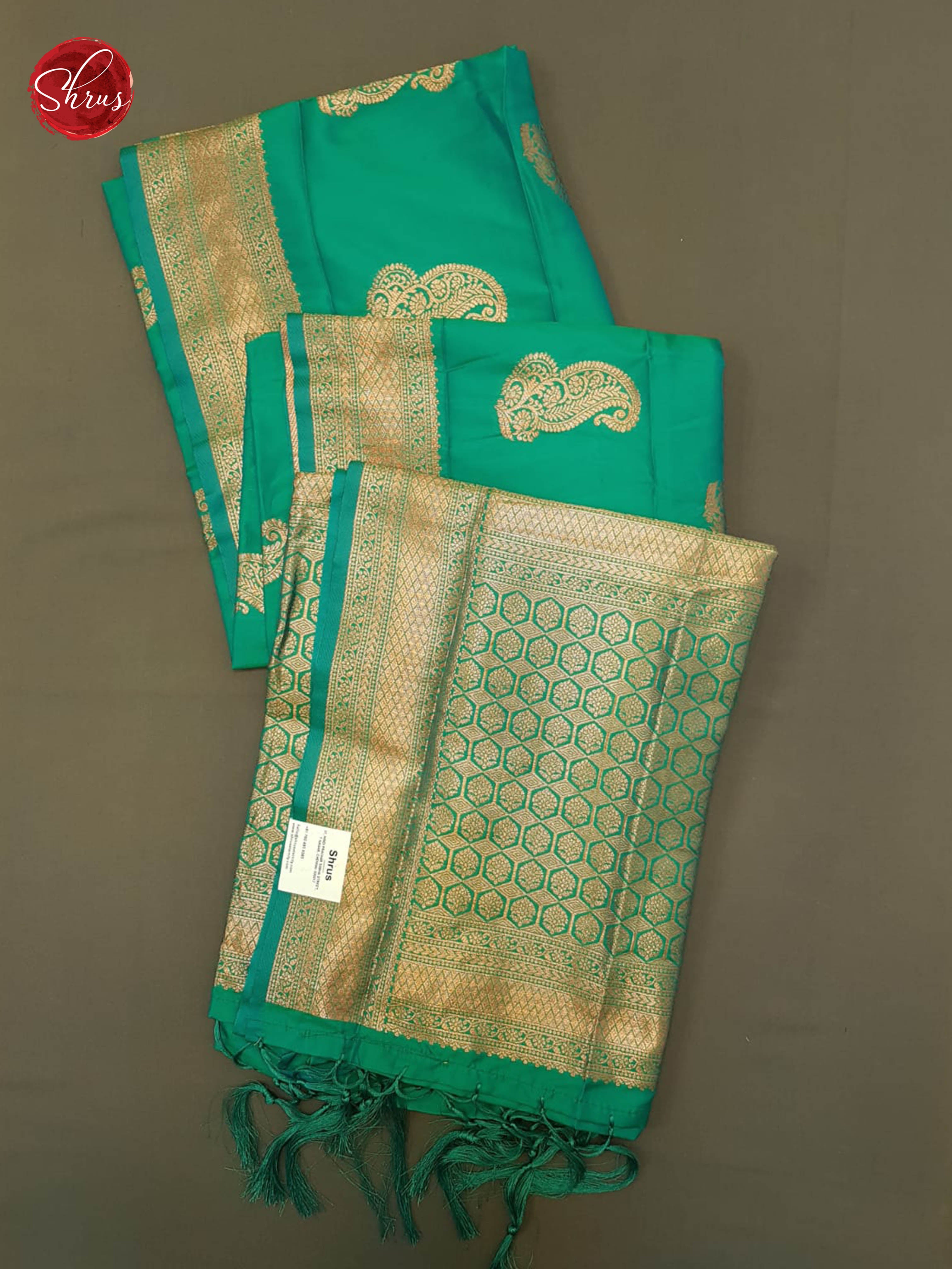 Green(Single tone)- Semi Khatan with zari woven floral paisleys motifs on the body& Zari Border - Shop on ShrusEternity.com
