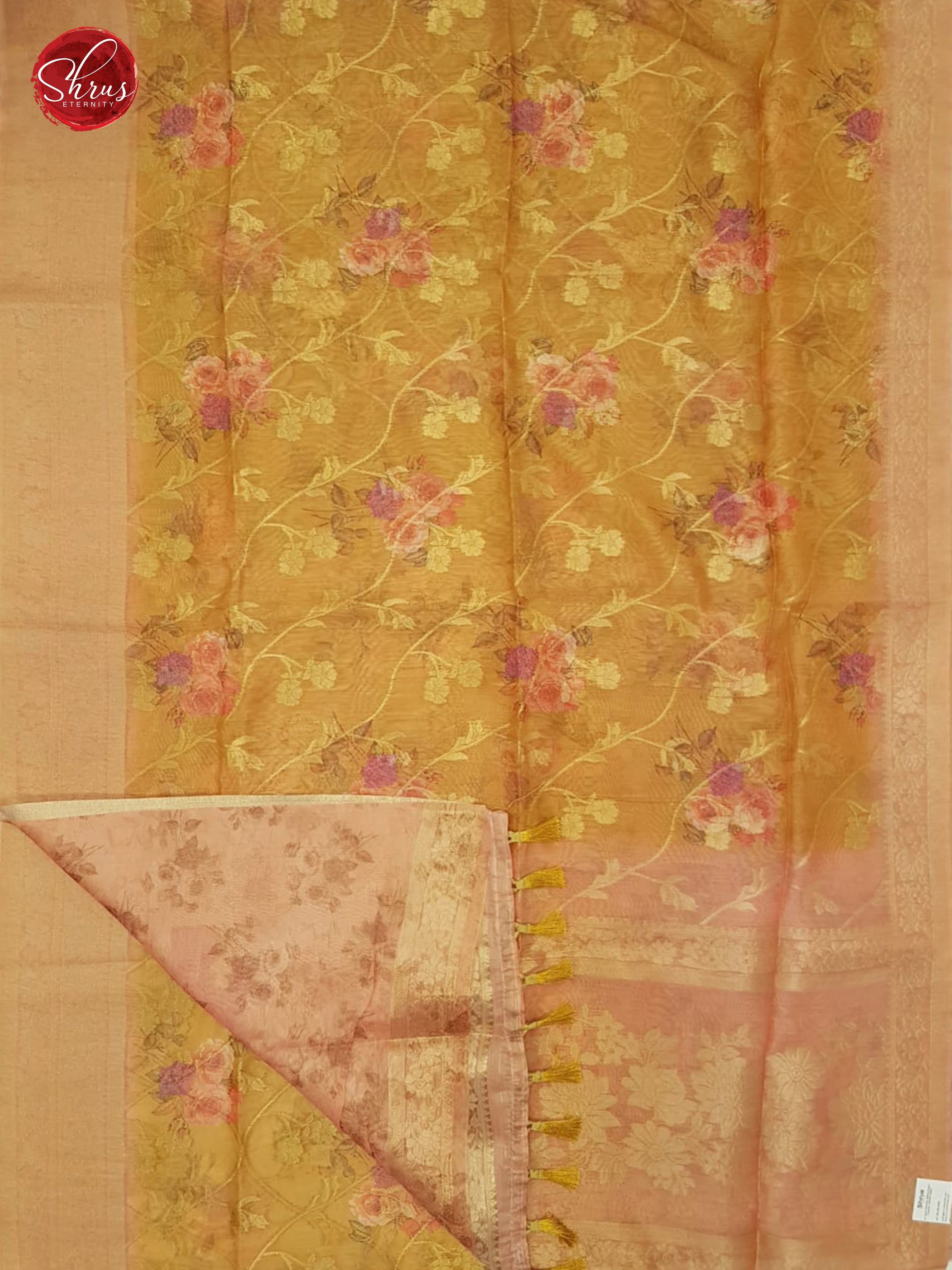 Mustard & Pink-  Semi Jute with floral  Print , zari floral nestling on the  Body & zari Border - Shop on ShrusEternity.com