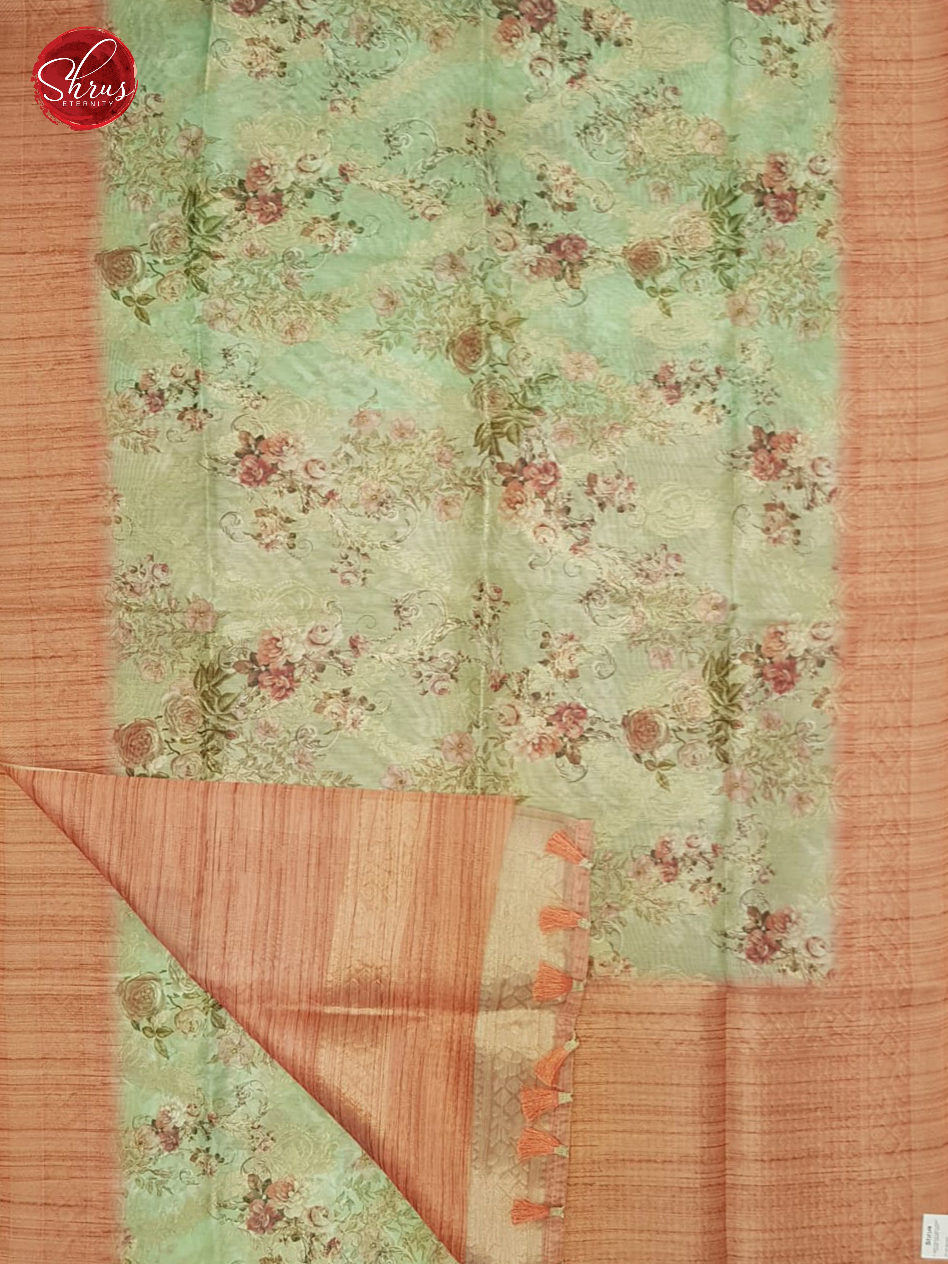 Green & Peach - Semi Jute with floral  Print , zari floral nestling on the  Body & zari Border - Shop on ShrusEternity.com