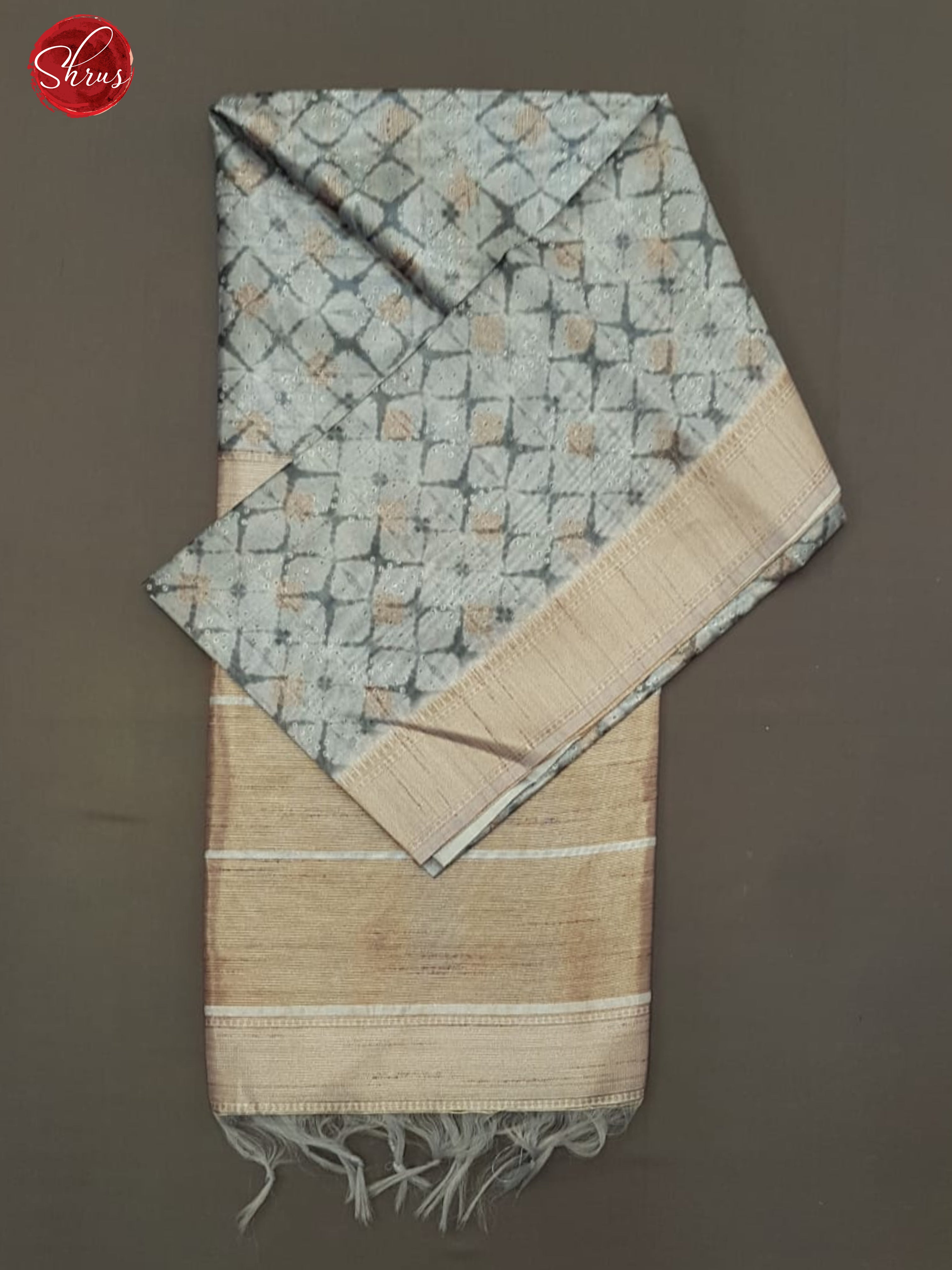 Grey(Single Tone)- Semi Tussar with zari  buttas, floral pattern  on the body & contrast   border - Shop on ShrusEternity.com