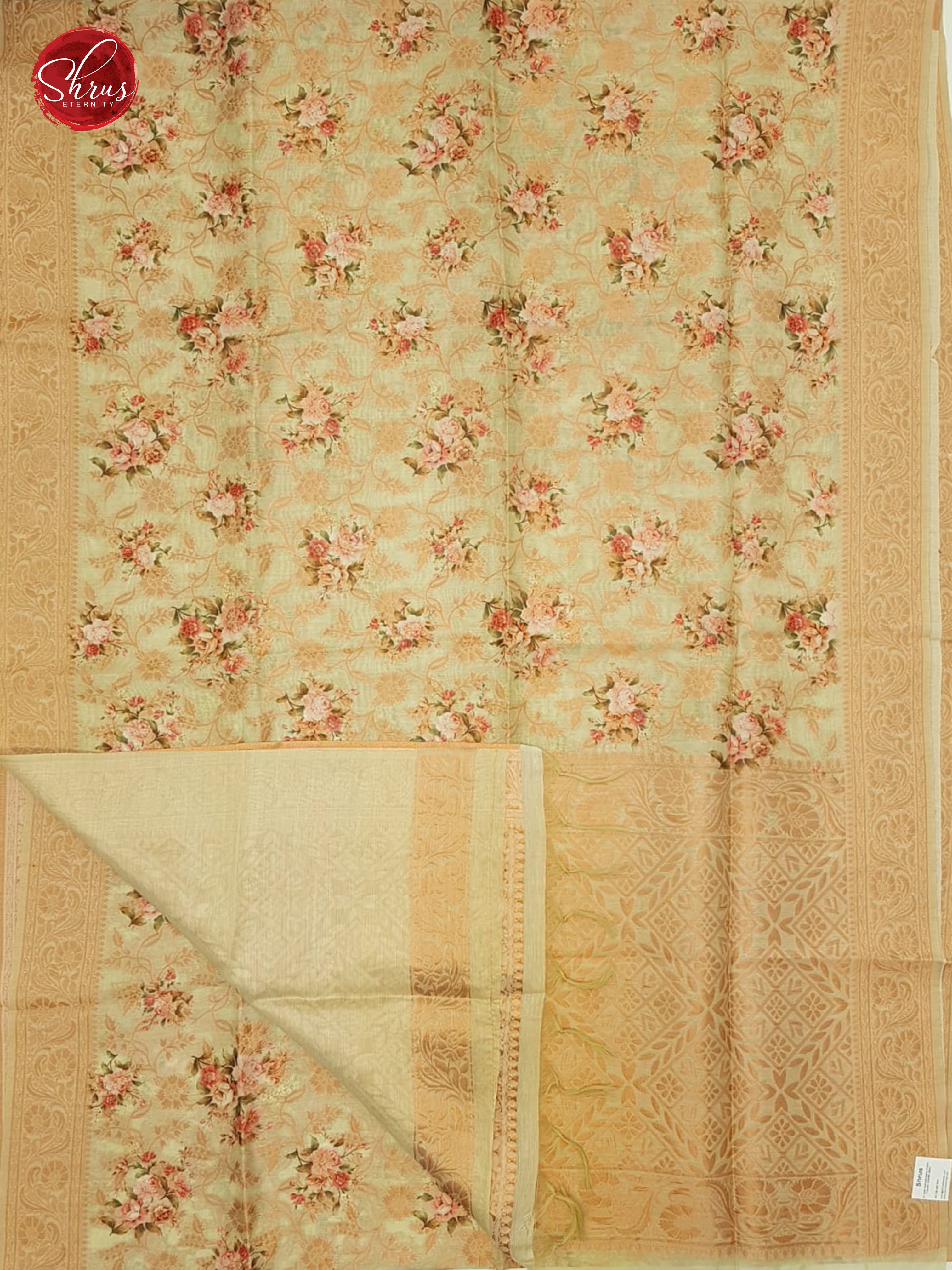 Beige  & Green -Semi Jute with floral  Print , zari floral nestling on the  Body & zari Border - Shop on ShrusEternity.com