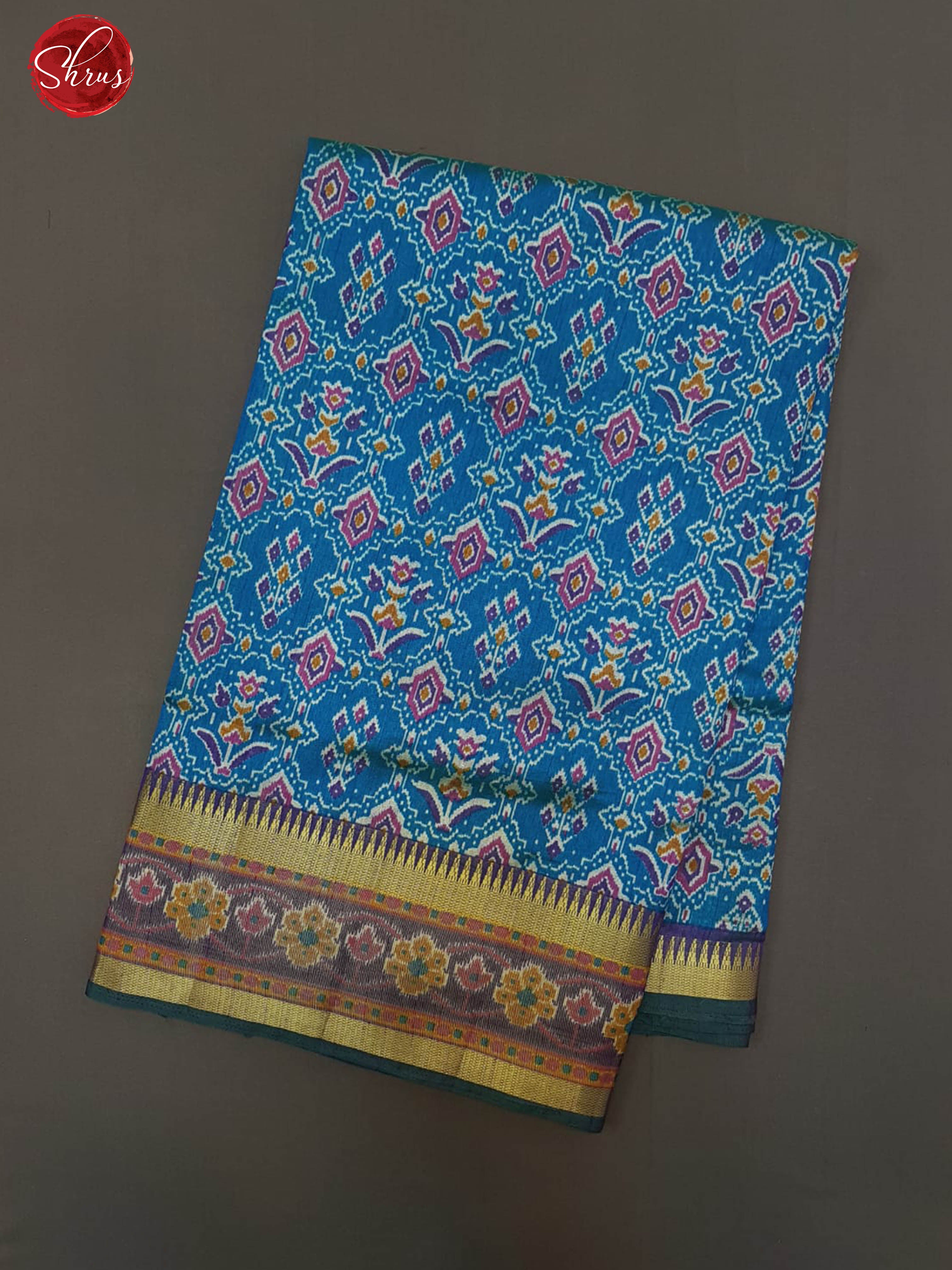 Peacock Blue & Purple - Semi Patola with patola floral print on the body  &  contrast Zari border - Shop on ShrusEternity.com