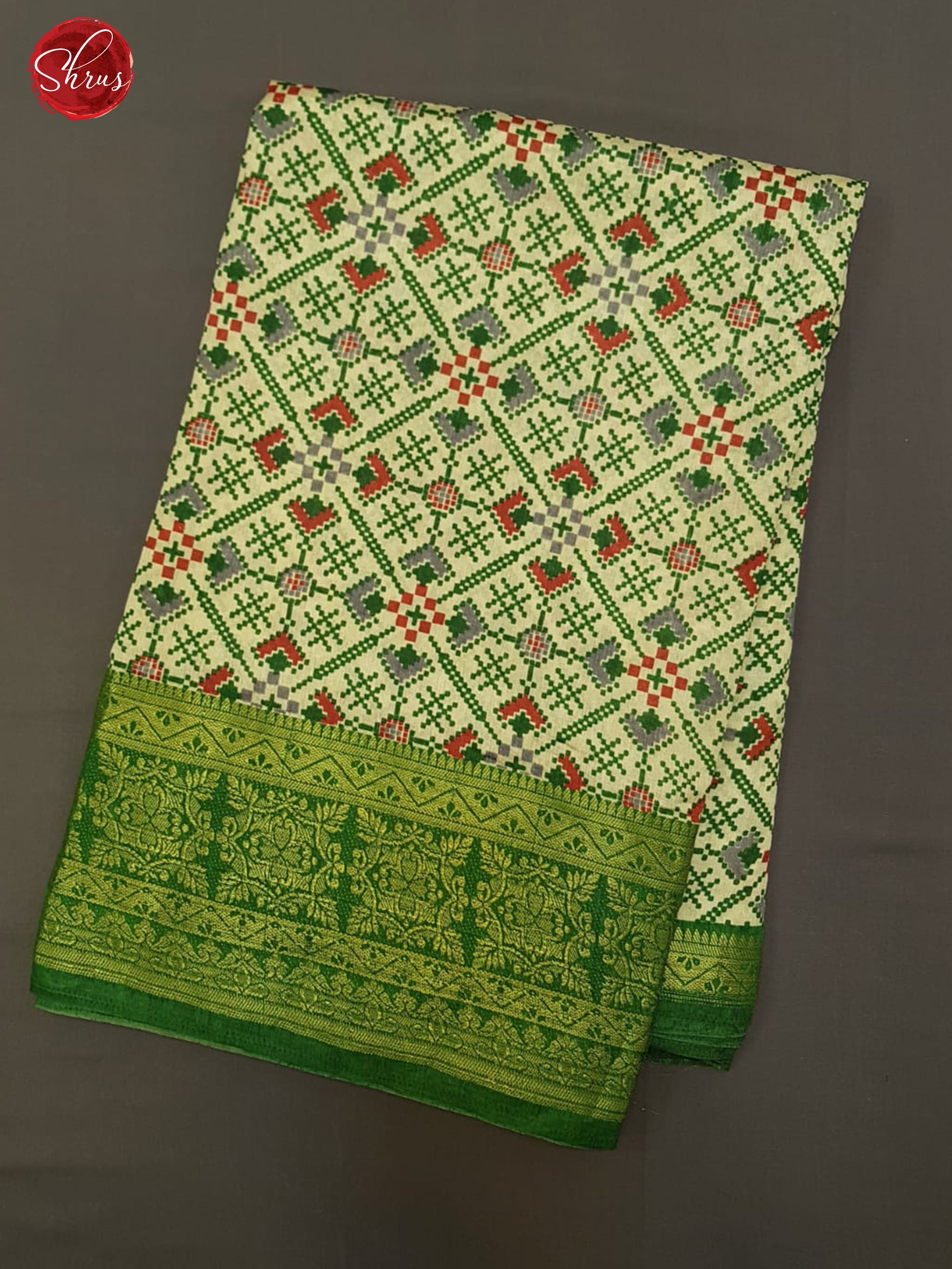 Cream and Green-Semi Patola with patola floral print on the body  &  contrast  zari border - Shop on ShrusEternity.com