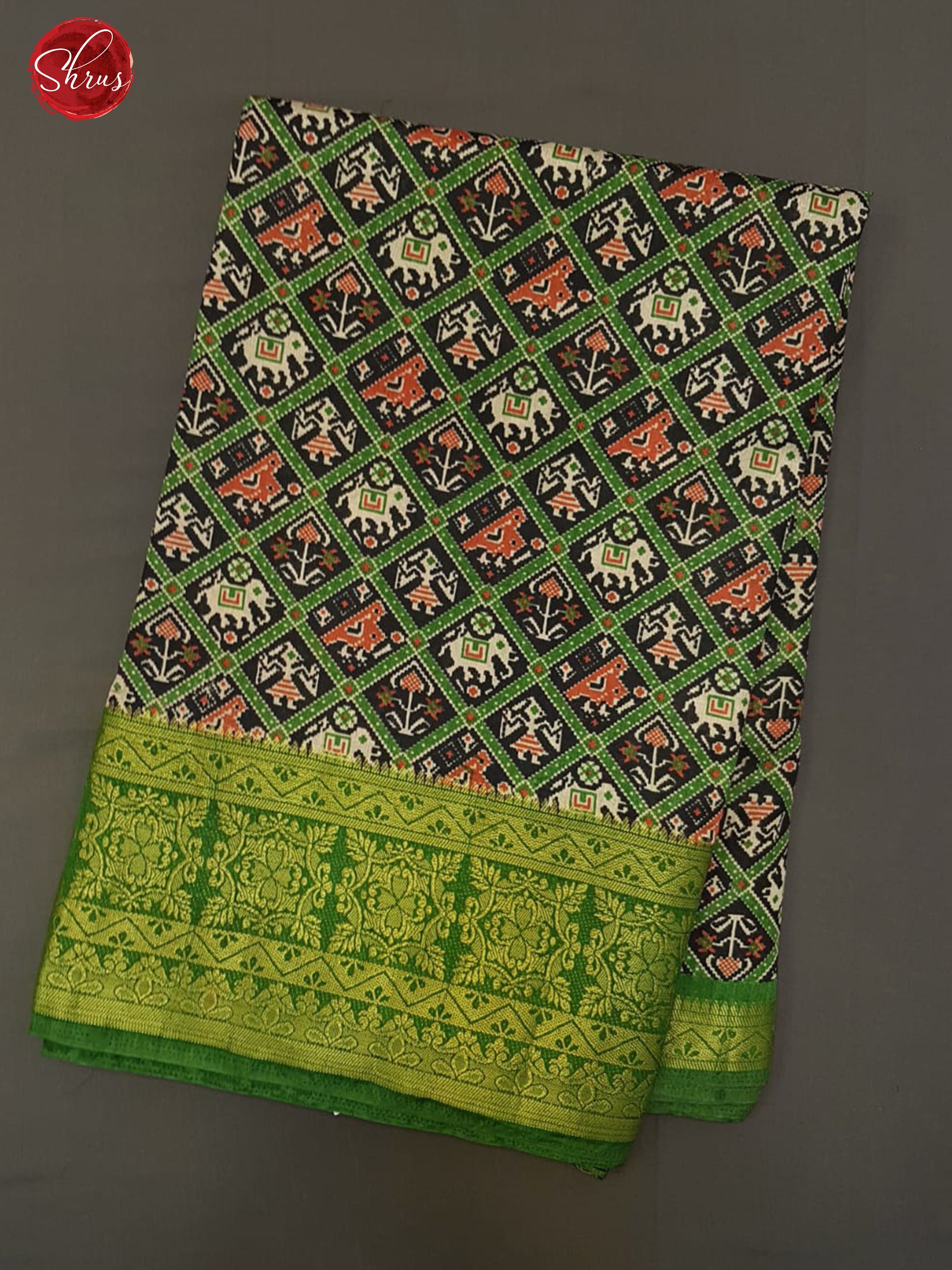 Black and Green -Semi Patola with patola floral print on the body  &  contrast  zari border - Shop on ShrusEternity.com