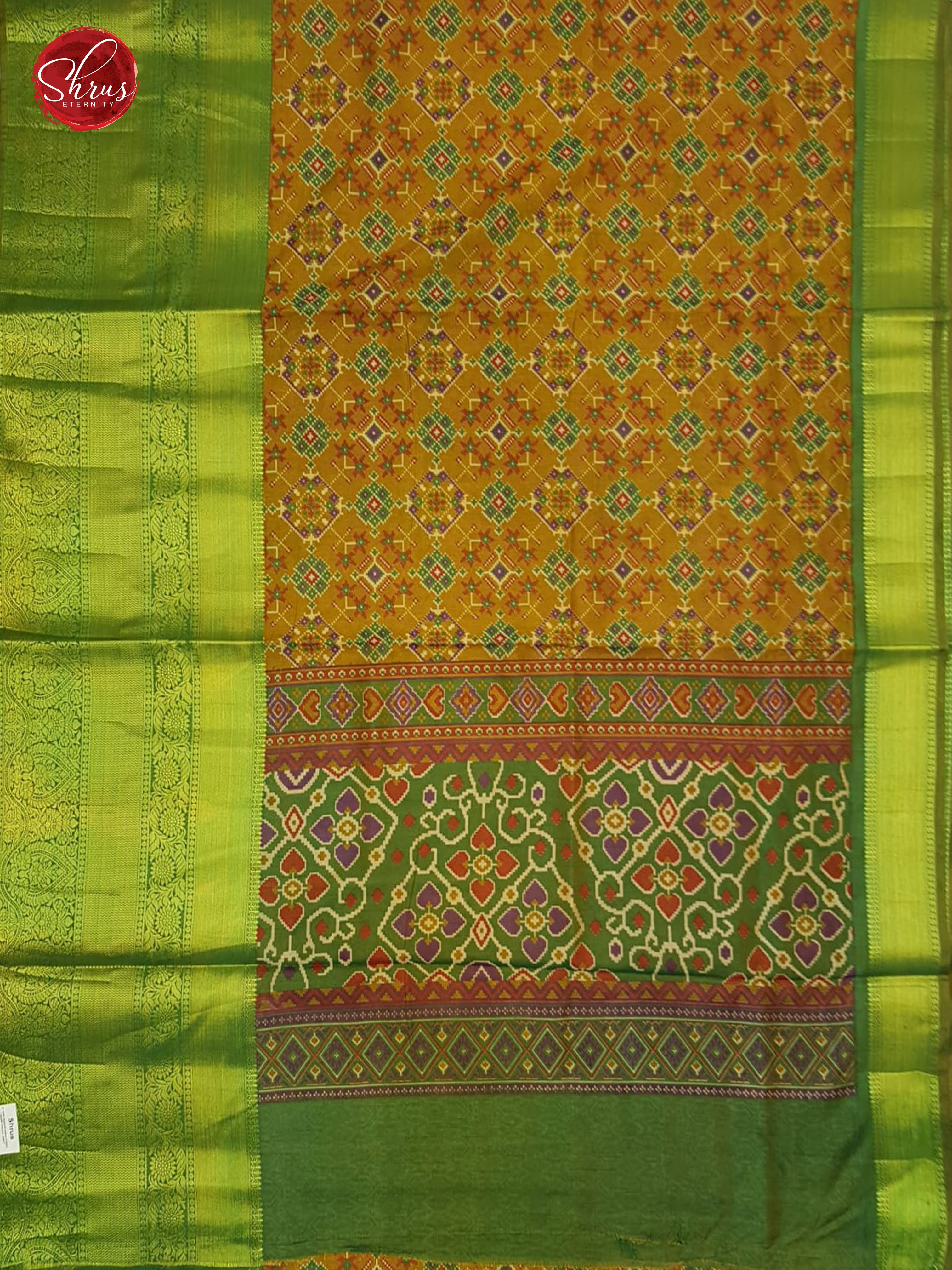 Mustard & Green - Semi Patola with patola floral print on the body  &  contrast  zari border - Shop on ShrusEternity.com