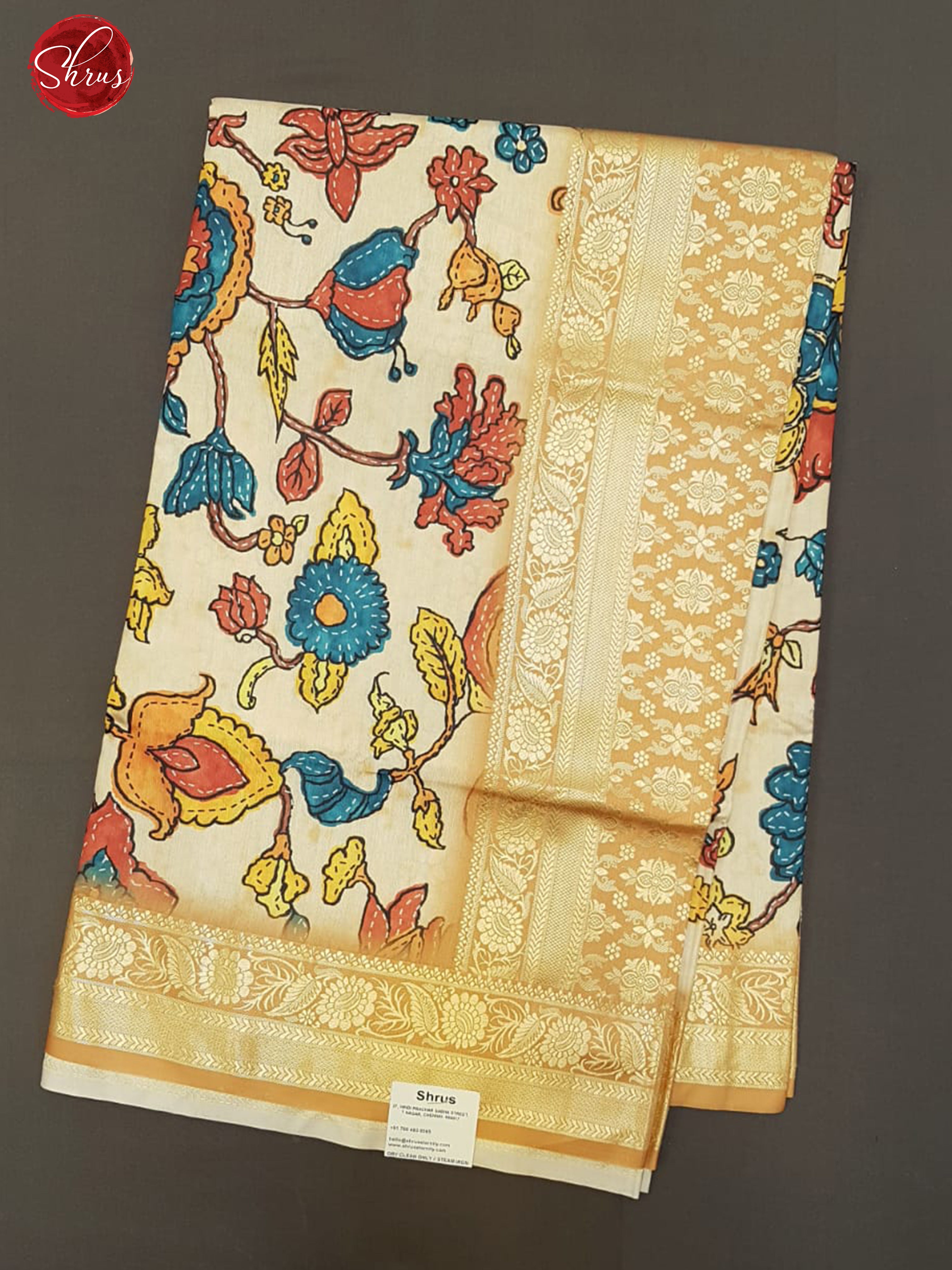 Cream  & Sandal -  Semi Crepe with floral print on the body & Zari Border - Shop on ShrusEternity.com