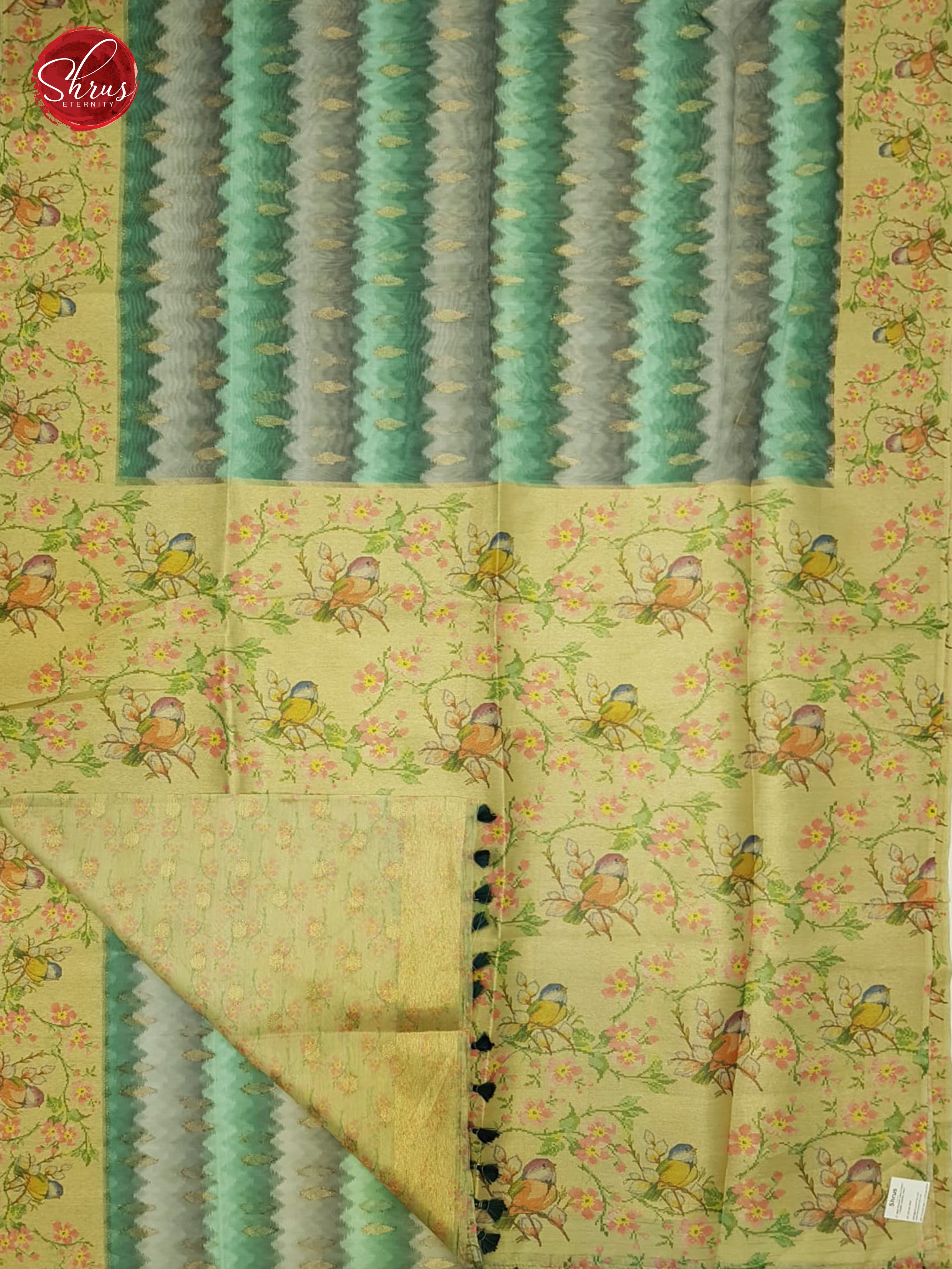 Green & Dull Gold - Semi Jute with  floral  Print , zari Butta on the Body & contrast printed  Border - Shop on ShrusEternity.com