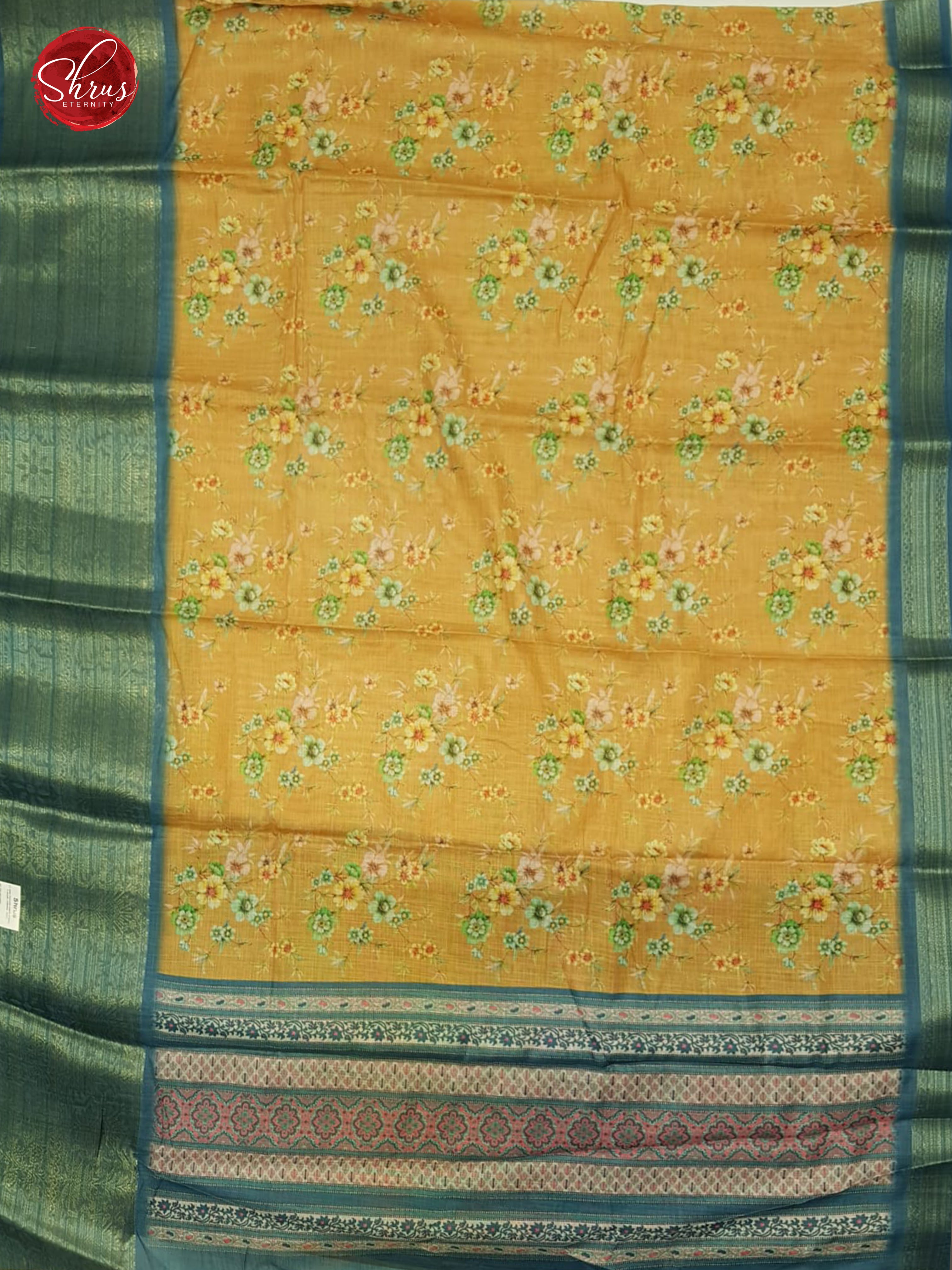 Musard & Blue-   Matka Cotton with floral print on the Body &  contrast  zari  Border - Shop on ShrusEternity.com