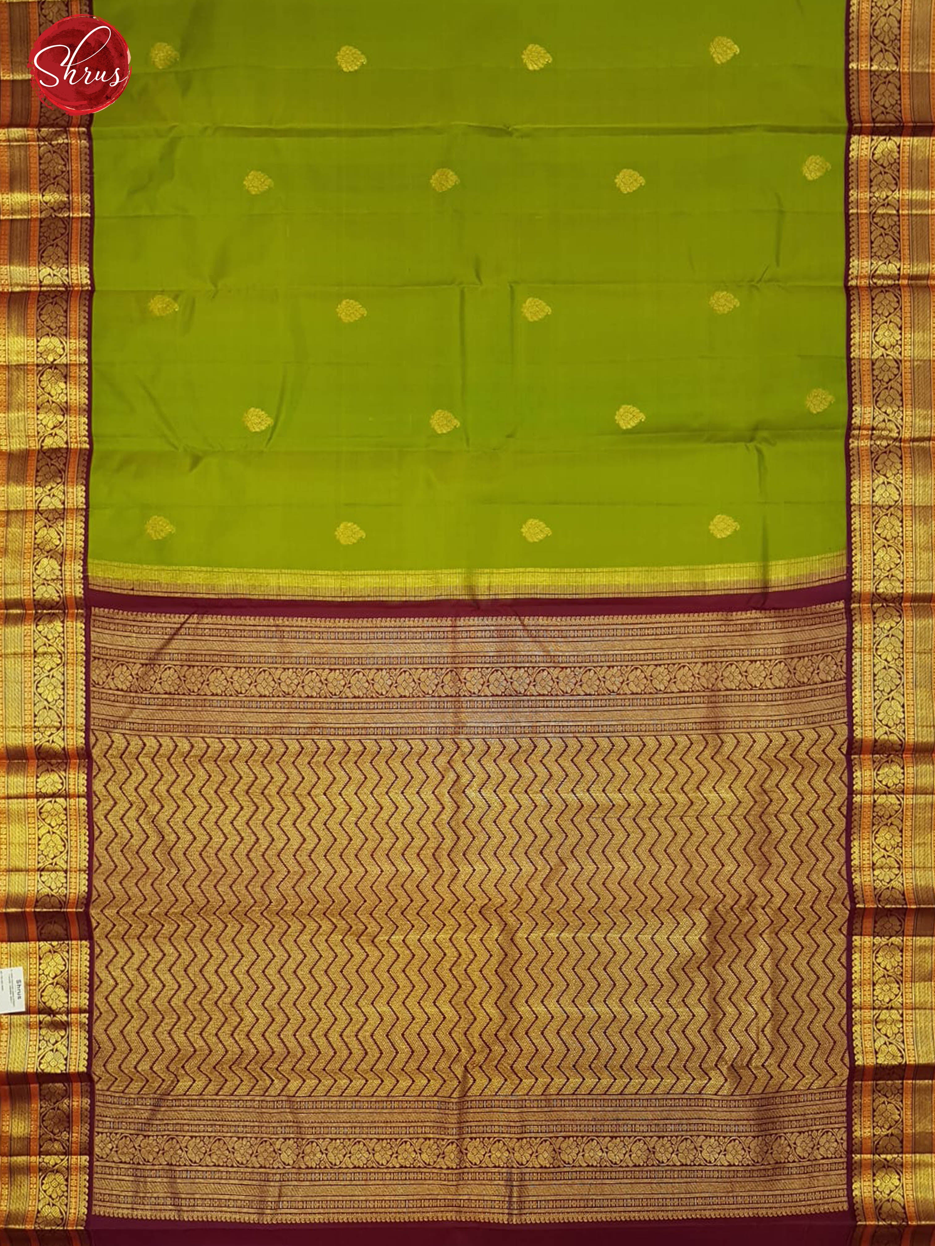 Green & Brown - Kanchipuram Silk with zari buttas on the body & Zari Border - Shop on ShrusEternity.com