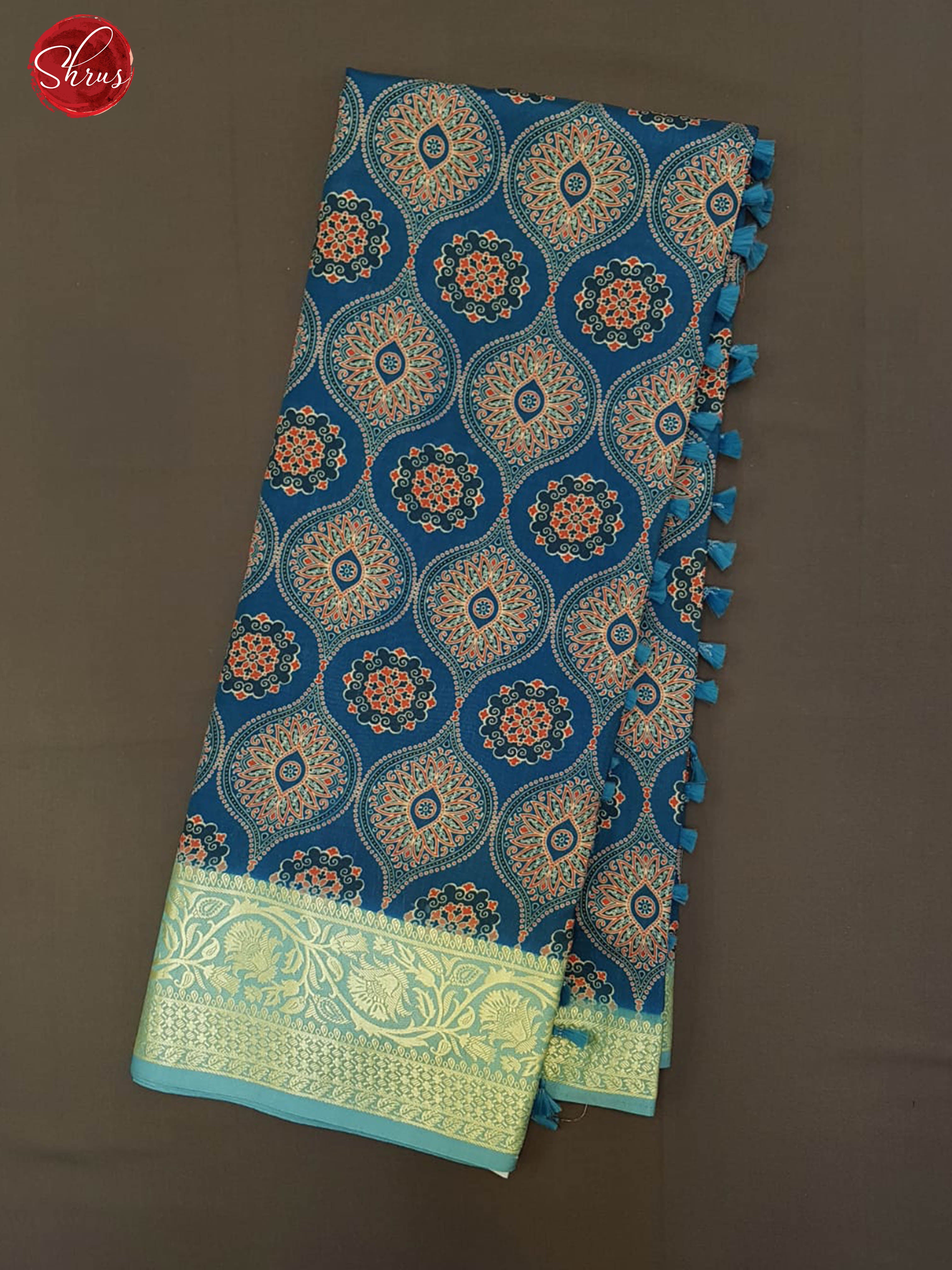 Blue & Orange - Semi Crepe with floral print on the body & Zari Border - Shop on ShrusEternity.com