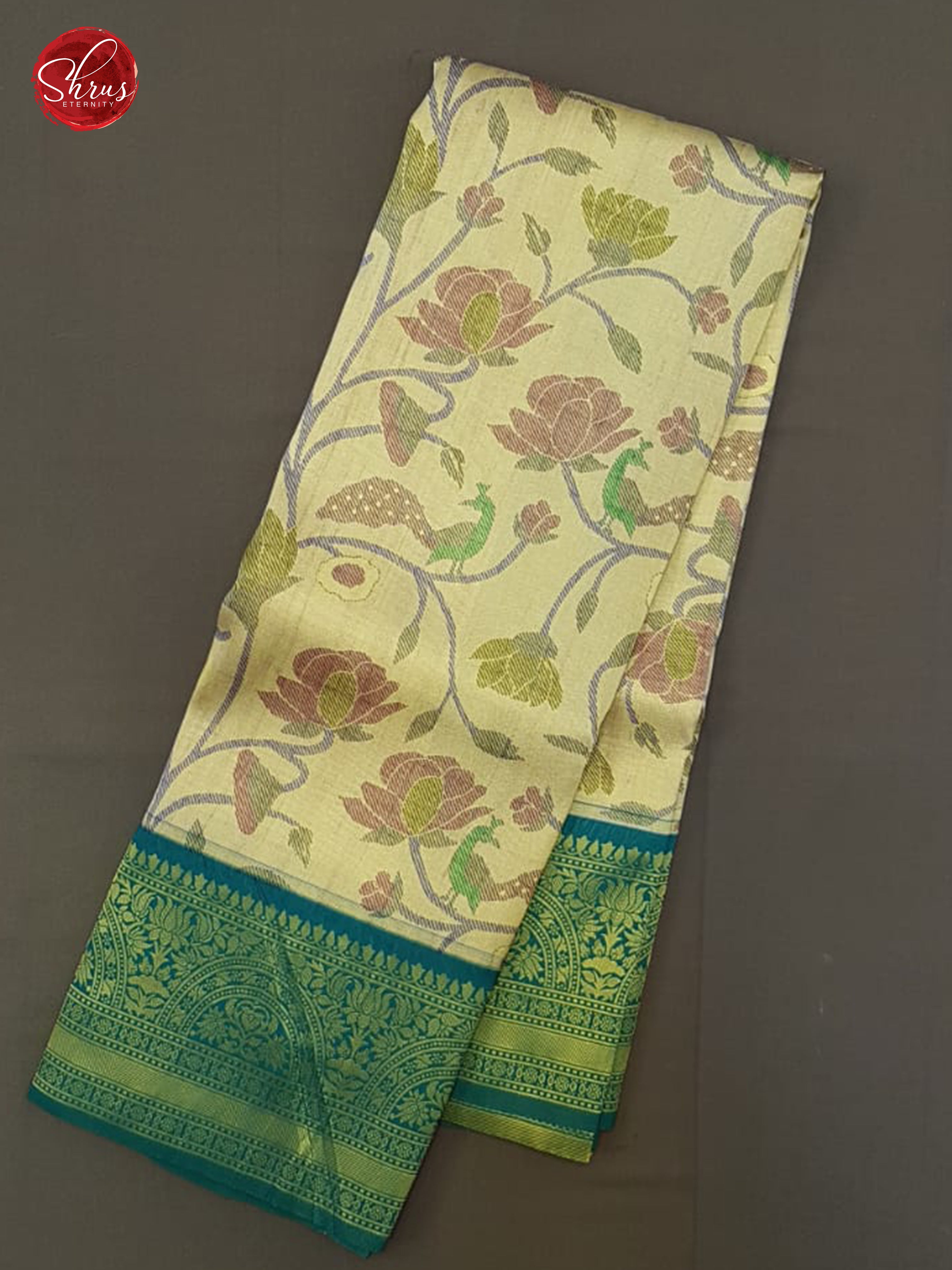 Beige & Green - Semi Kanchipuram with floral woven  pattern  on the body &  contrast  Zari Border - Shop on ShrusEternity.com