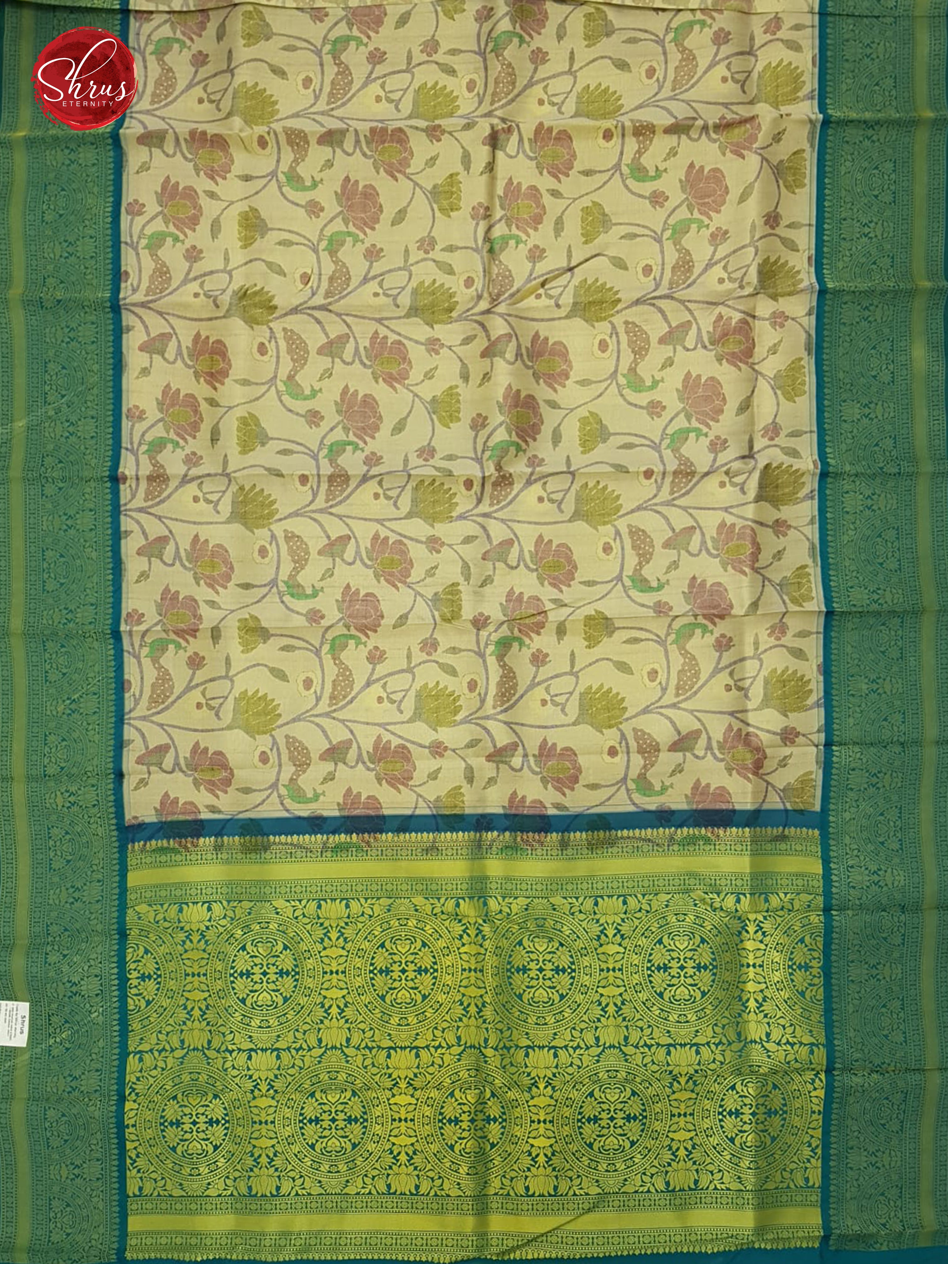 Beige & Green - Semi Kanchipuram with floral woven  pattern  on the body &  contrast  Zari Border - Shop on ShrusEternity.com