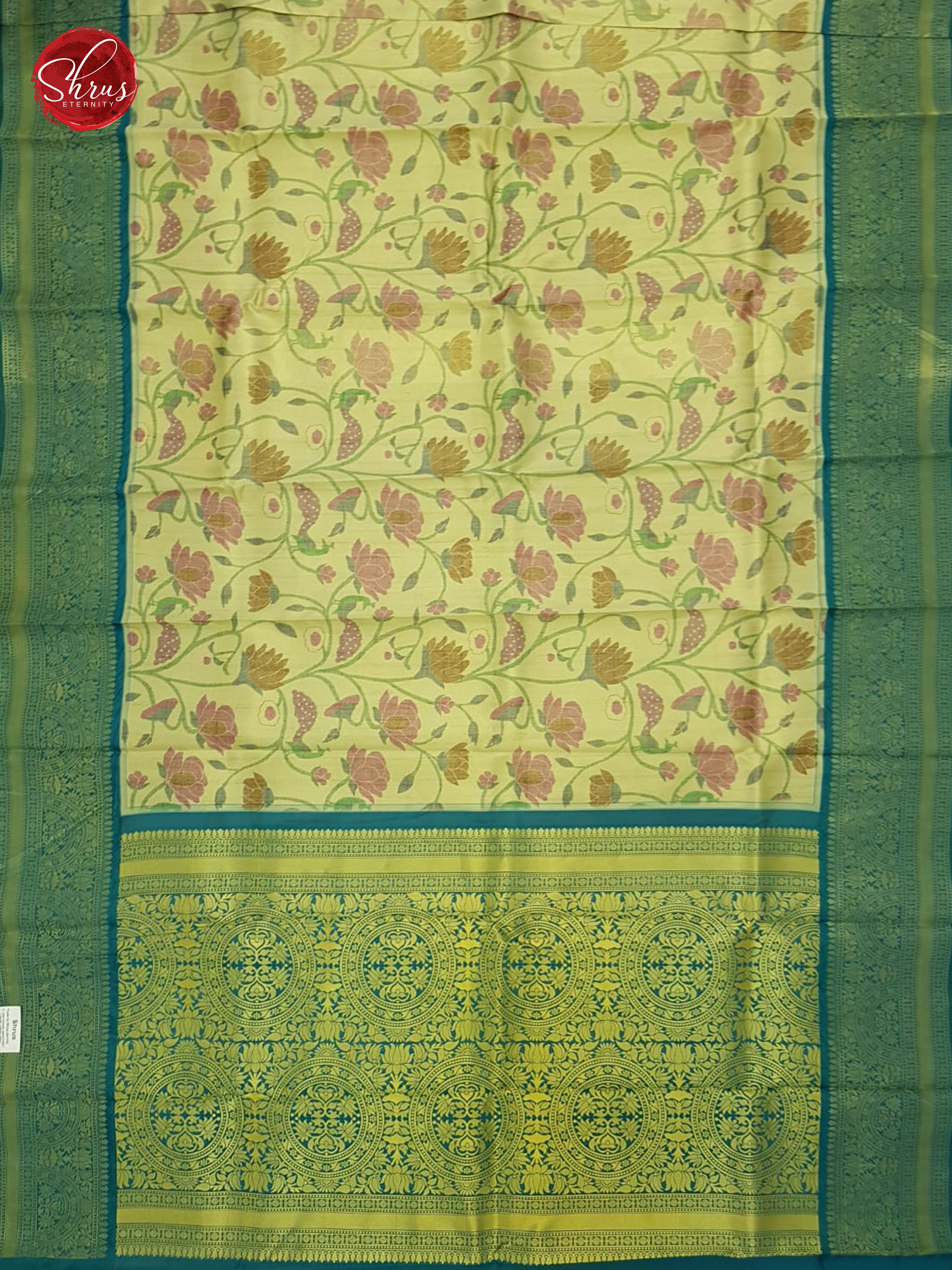 Light Green & Green - Semi Kanchipuram with thread woven floral pattern  on the body &   Zari Border - Shop on ShrusEternity.com