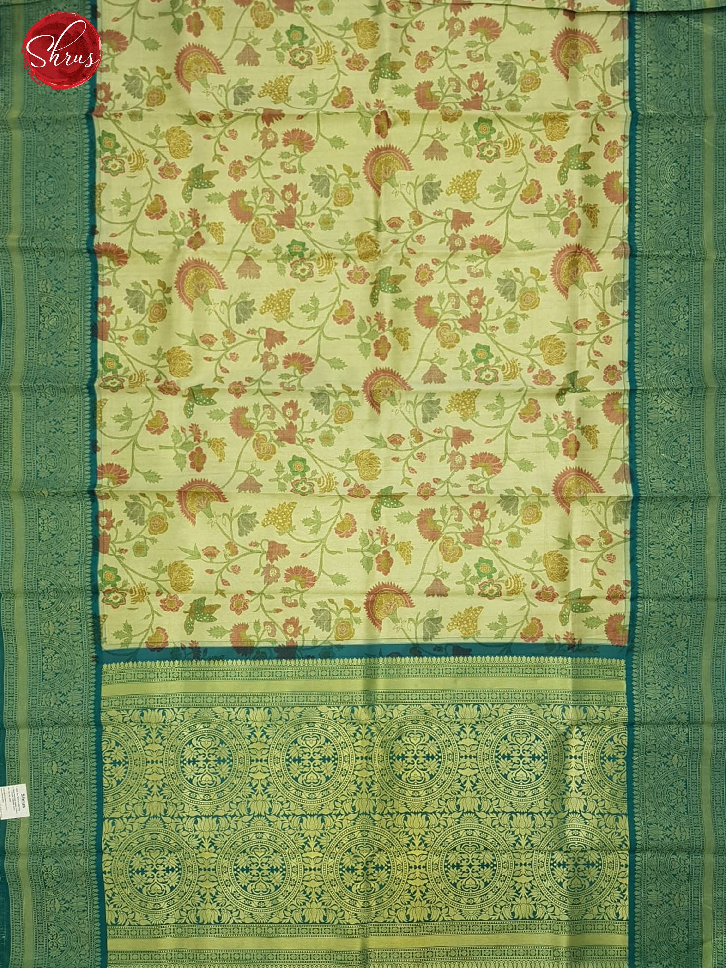 Beige & Green - Semi Kanchipuram Silk with thread woven floral nestling  on the body & contrast zari border - Shop on ShrusEternity.com