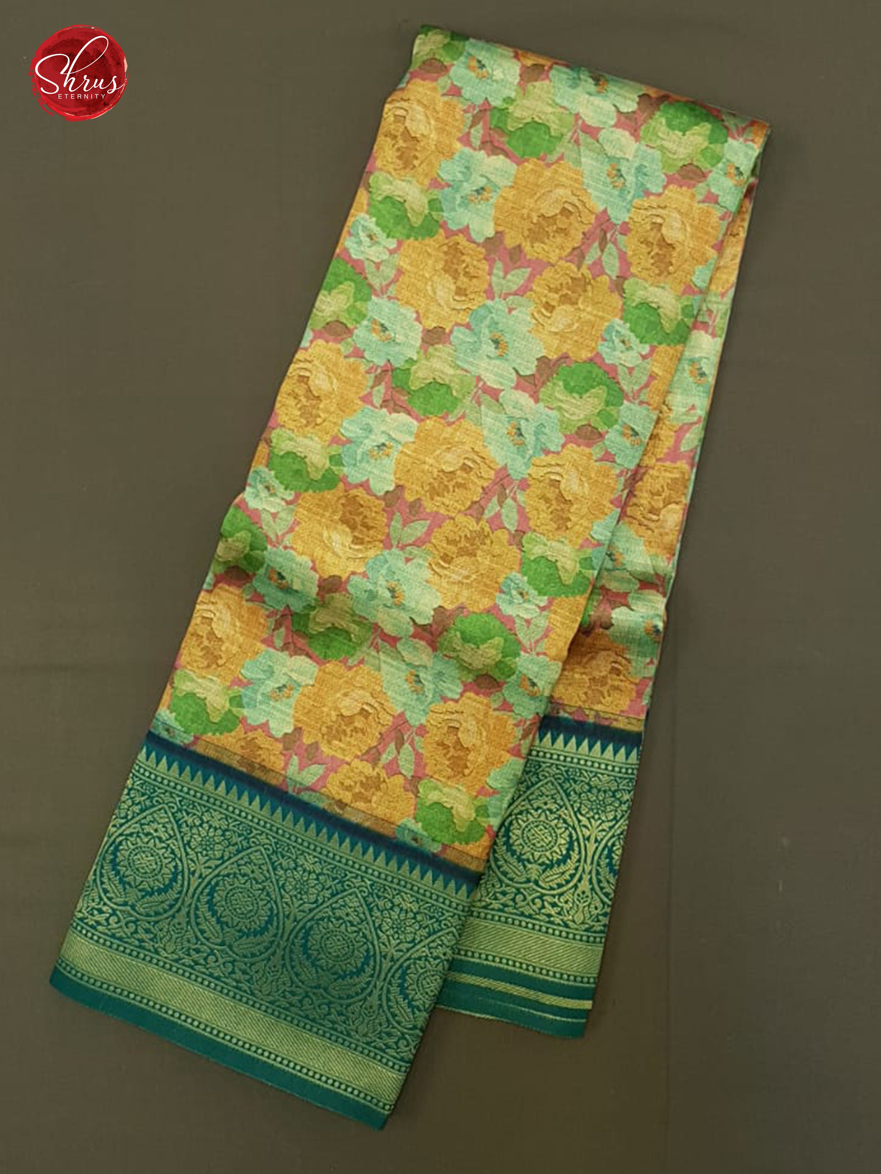 Orange & Green-   Semi Kanchipuram with  floral print   on the body &   Zari Border - Shop on ShrusEternity.com