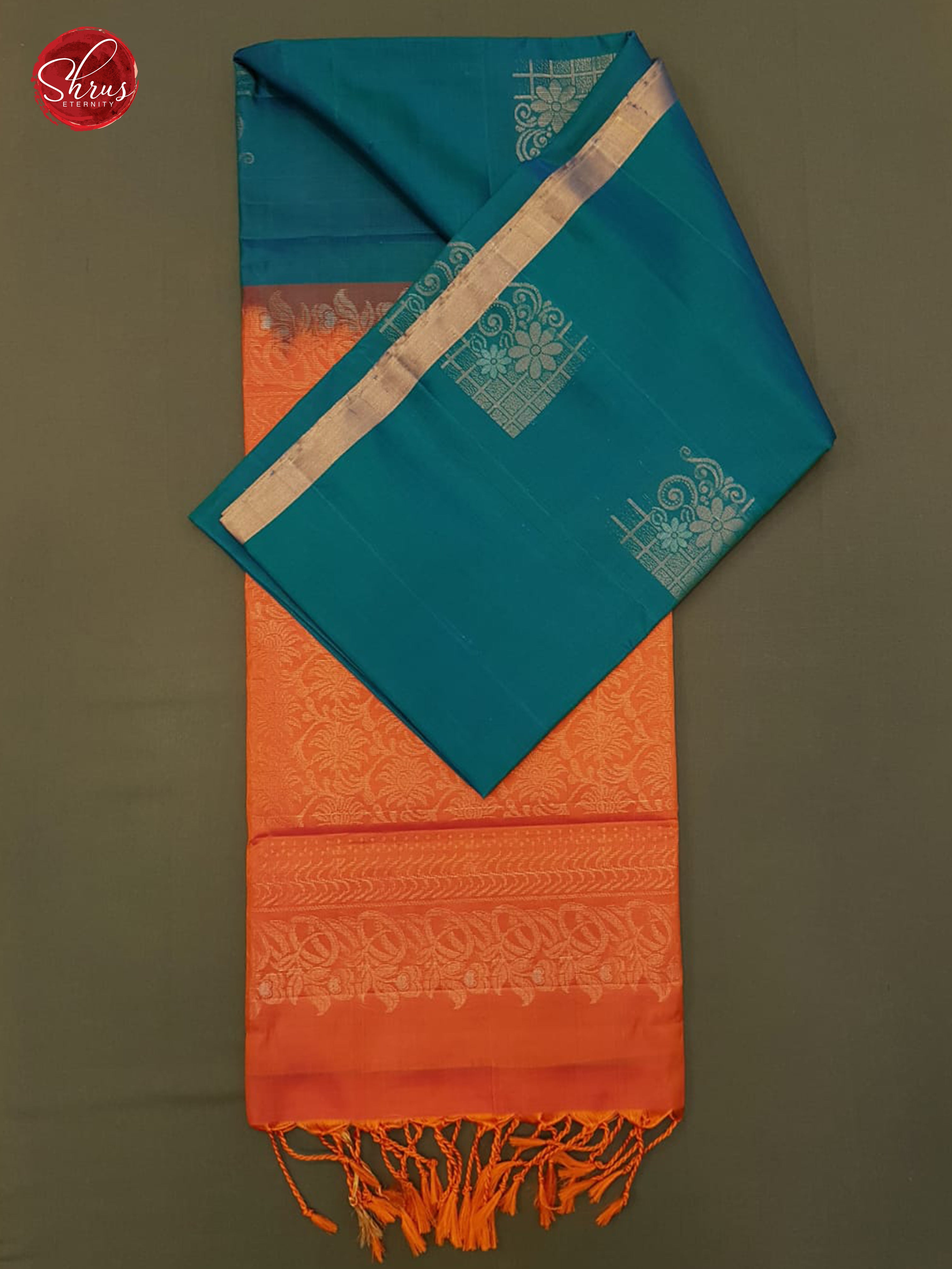 Peacock Blue & Orange-  Borderless  Silk  (half-Pure) with  Zari woven  motifs  on the body - Shop on ShrusEternity.com