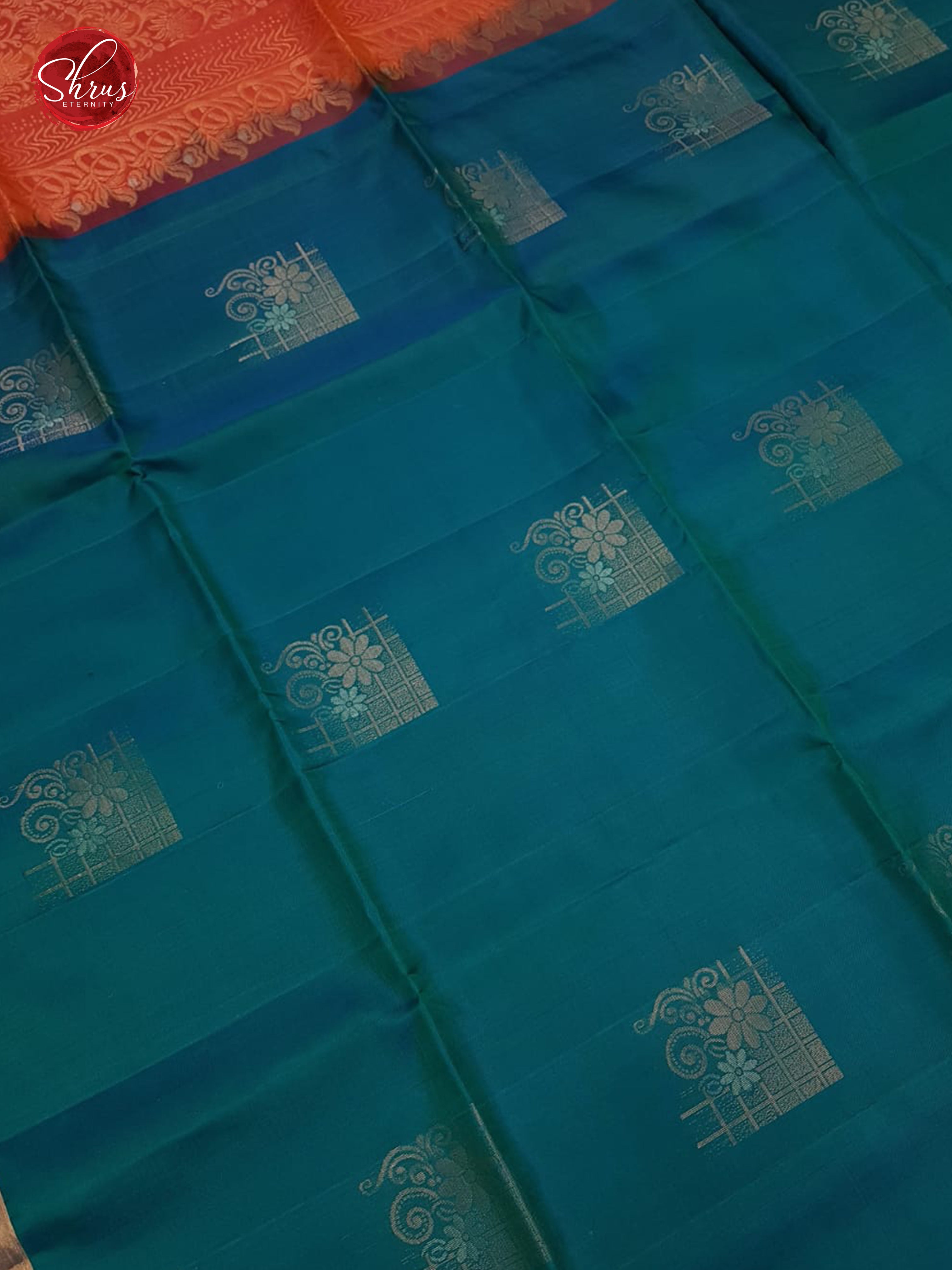 Peacock Blue & Orange-  Borderless  Silk  (half-Pure) with  Zari woven  motifs  on the body - Shop on ShrusEternity.com