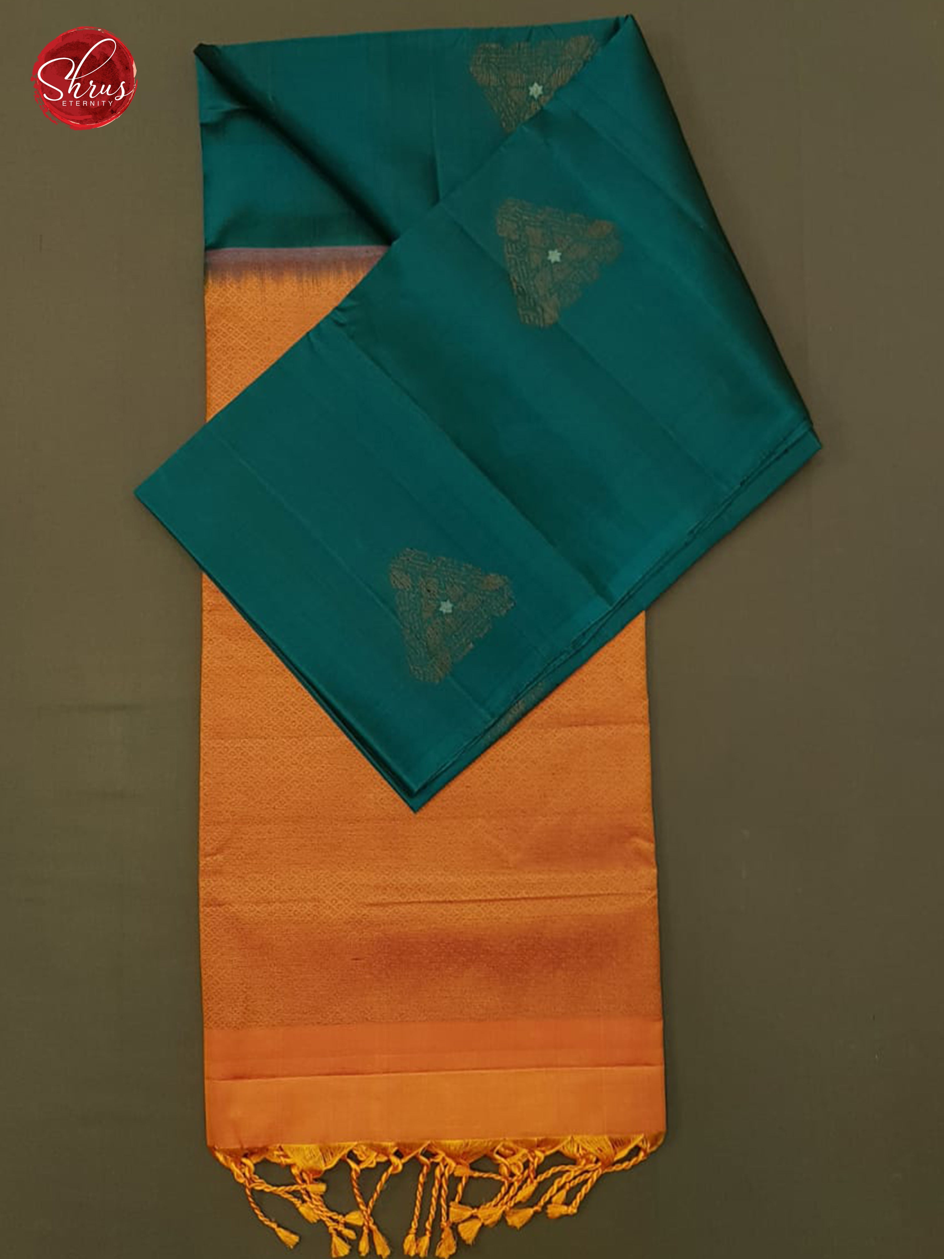Peacock Blue & Orange -Borderless  Silk  (half-Pure) with  Zari woven  floral motifs  on the body - Shop on ShrusEternity.com