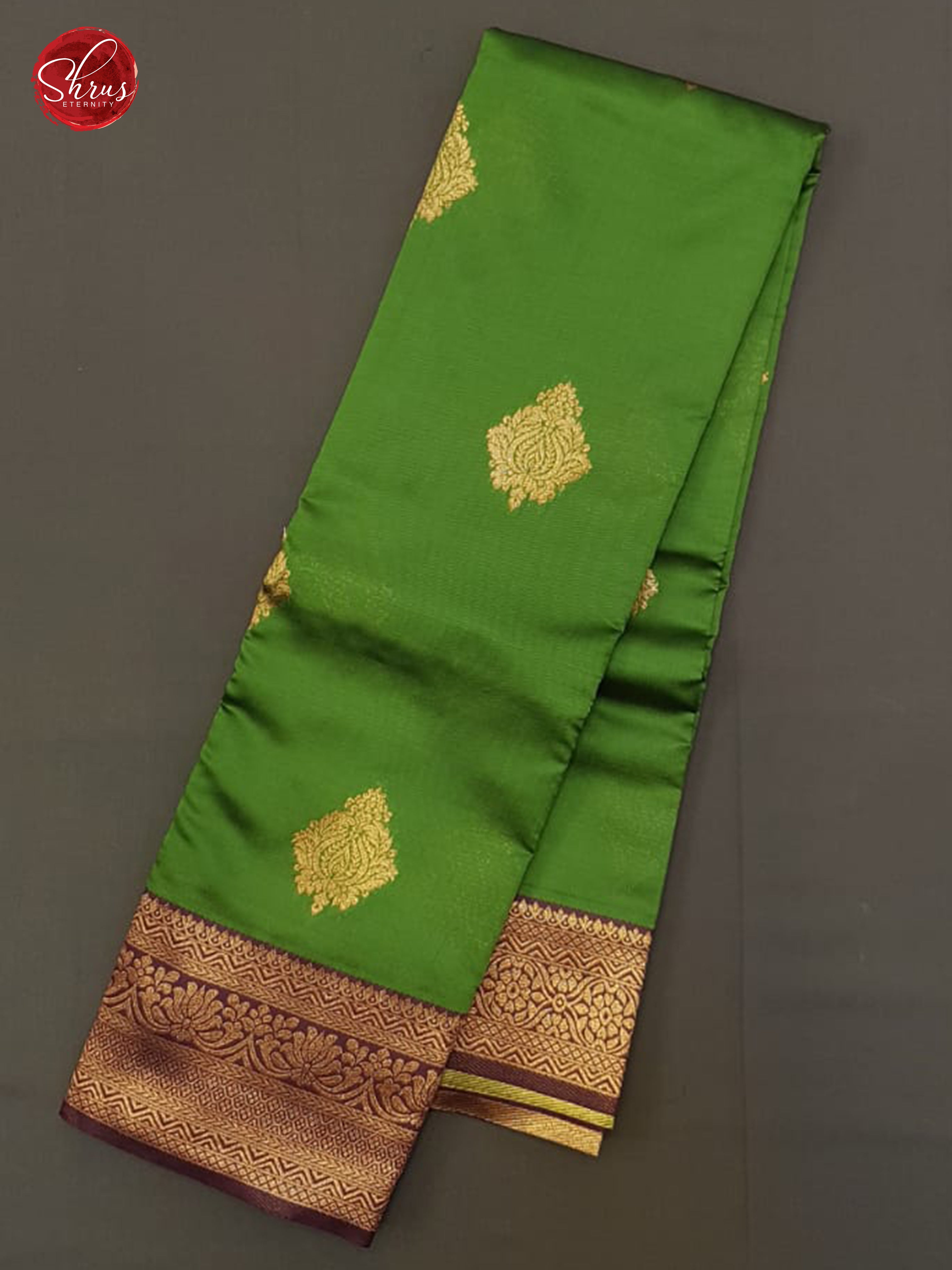 Green & Purple - Semi Soft Silk with zari woven floral motifs  on the body & contrast  Zari Border - Shop on ShrusEternity.com