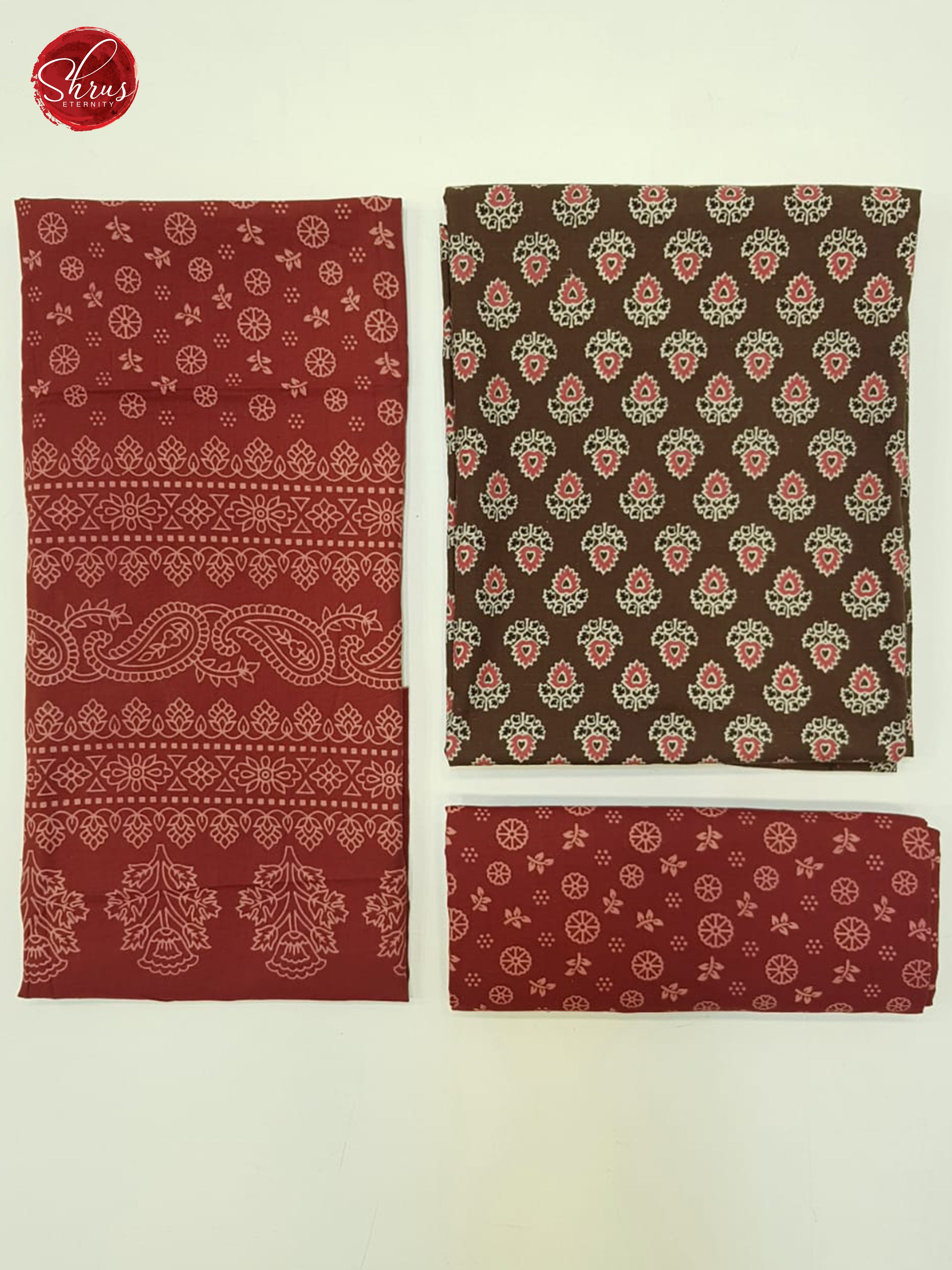 Brown & Maroon -  Ajrakh suit with floral block print on the tops(In all suits the left part is the Dupatta , Top right pic is top and Bottom Right is the bottom) - Shop on ShrusEternity.com