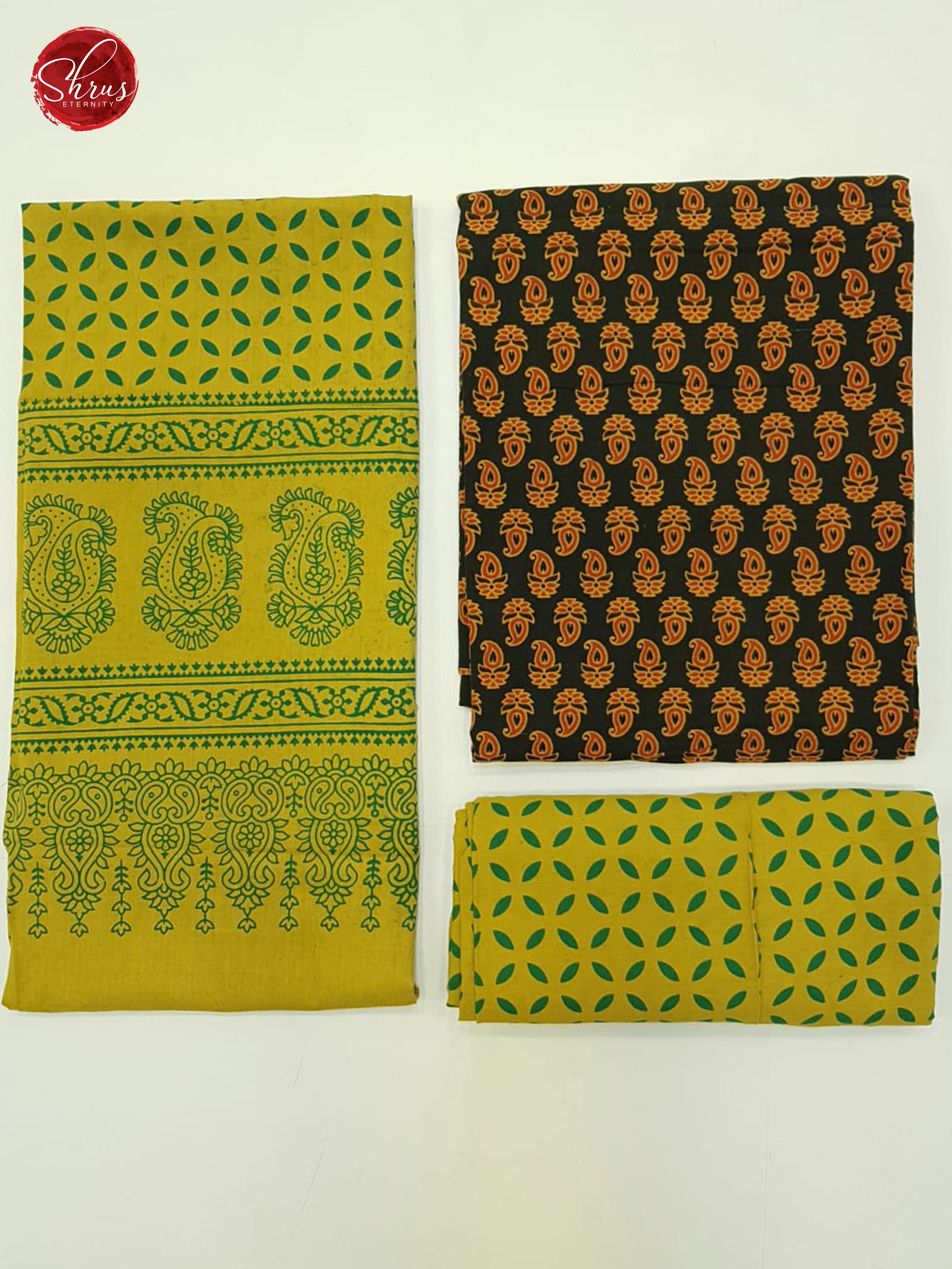 Green & Yellow -Ajrakh suit with floral block print on the tops(In all suits the left part is the Dupatta , Top right pic is top and Bottom Right is the bottom) - Shop on ShrusEternity.com