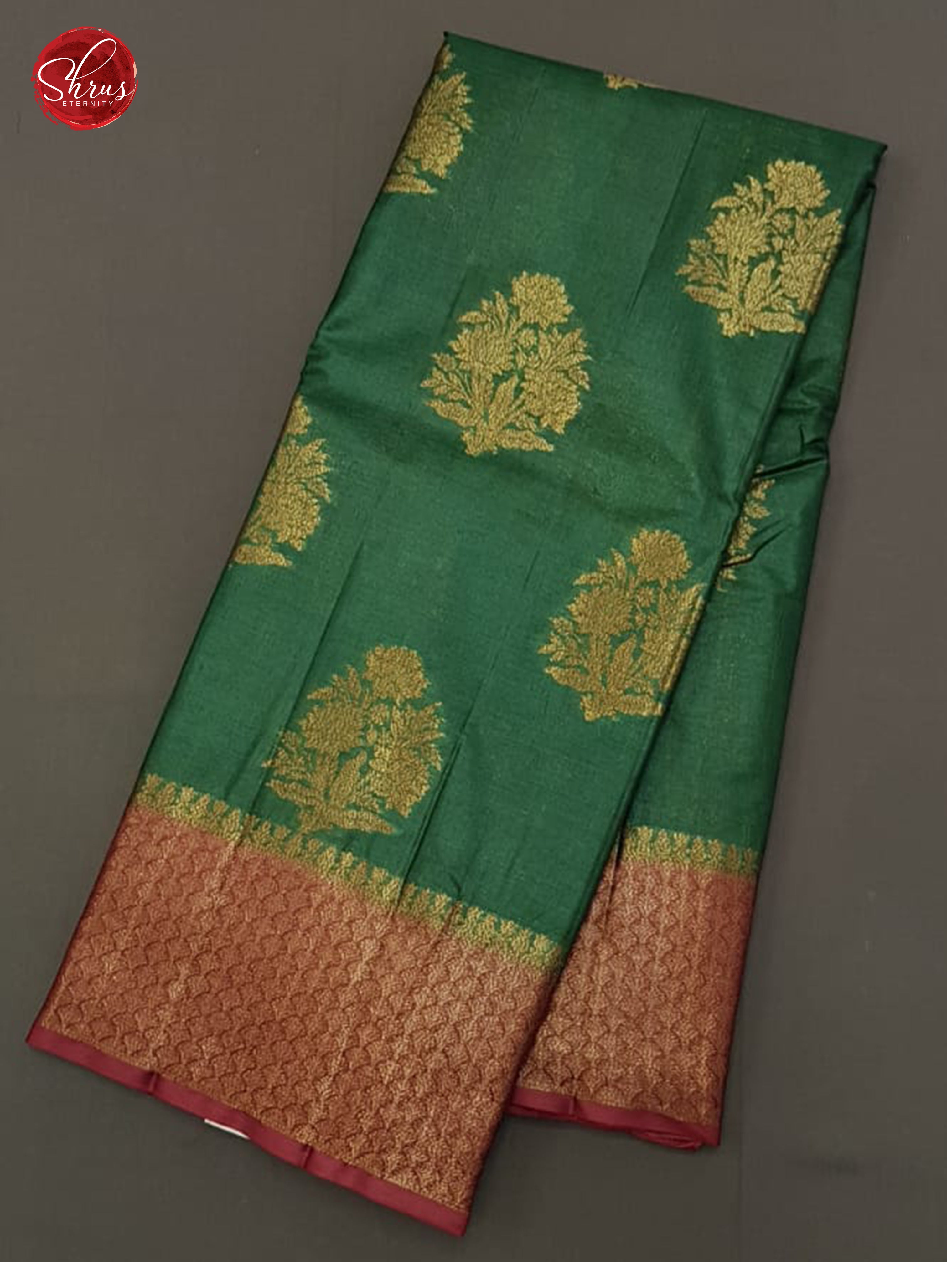 Green & Maroon - Tussar with zari woven floral motifs on the body & Zari Border - Shop on ShrusEternity.com