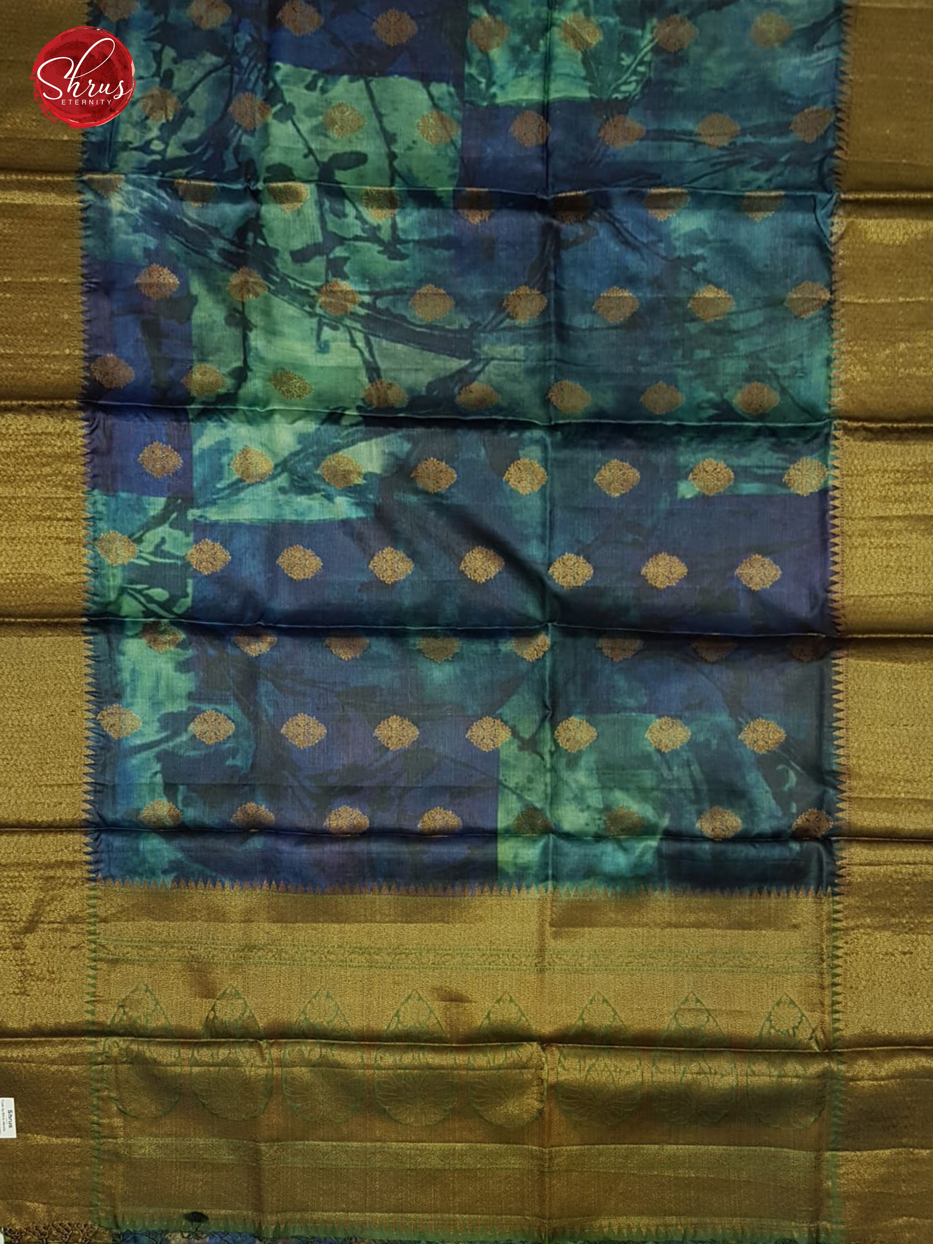 Blue & Green - Tussar with zari woven floral   motifs on the body & Zari Border - Shop on ShrusEternity.com