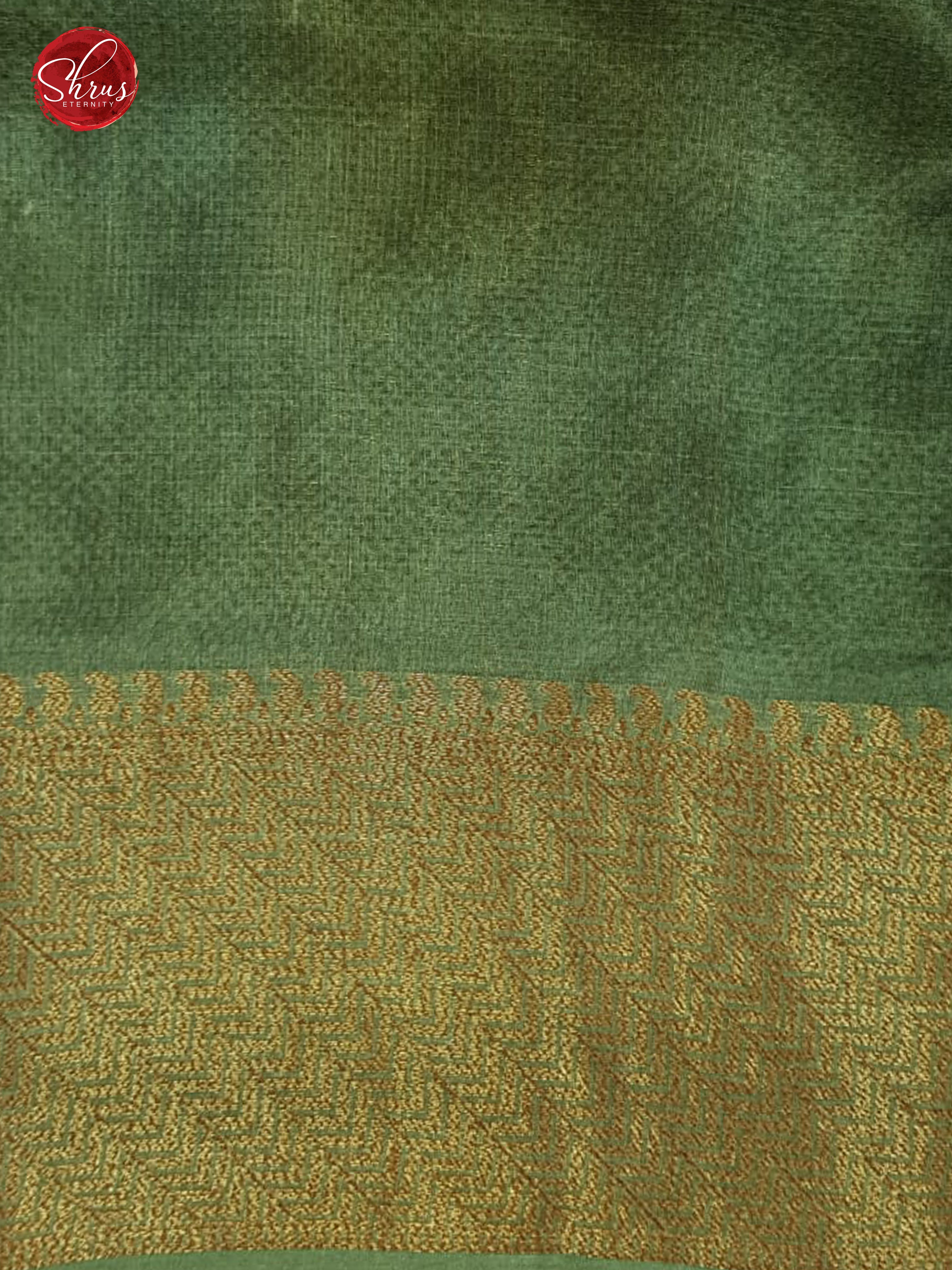 Green(Single Tone)-  Tussar with zari woven floral   motifs , floral print on the body & Zari Border - Shop on ShrusEternity.com