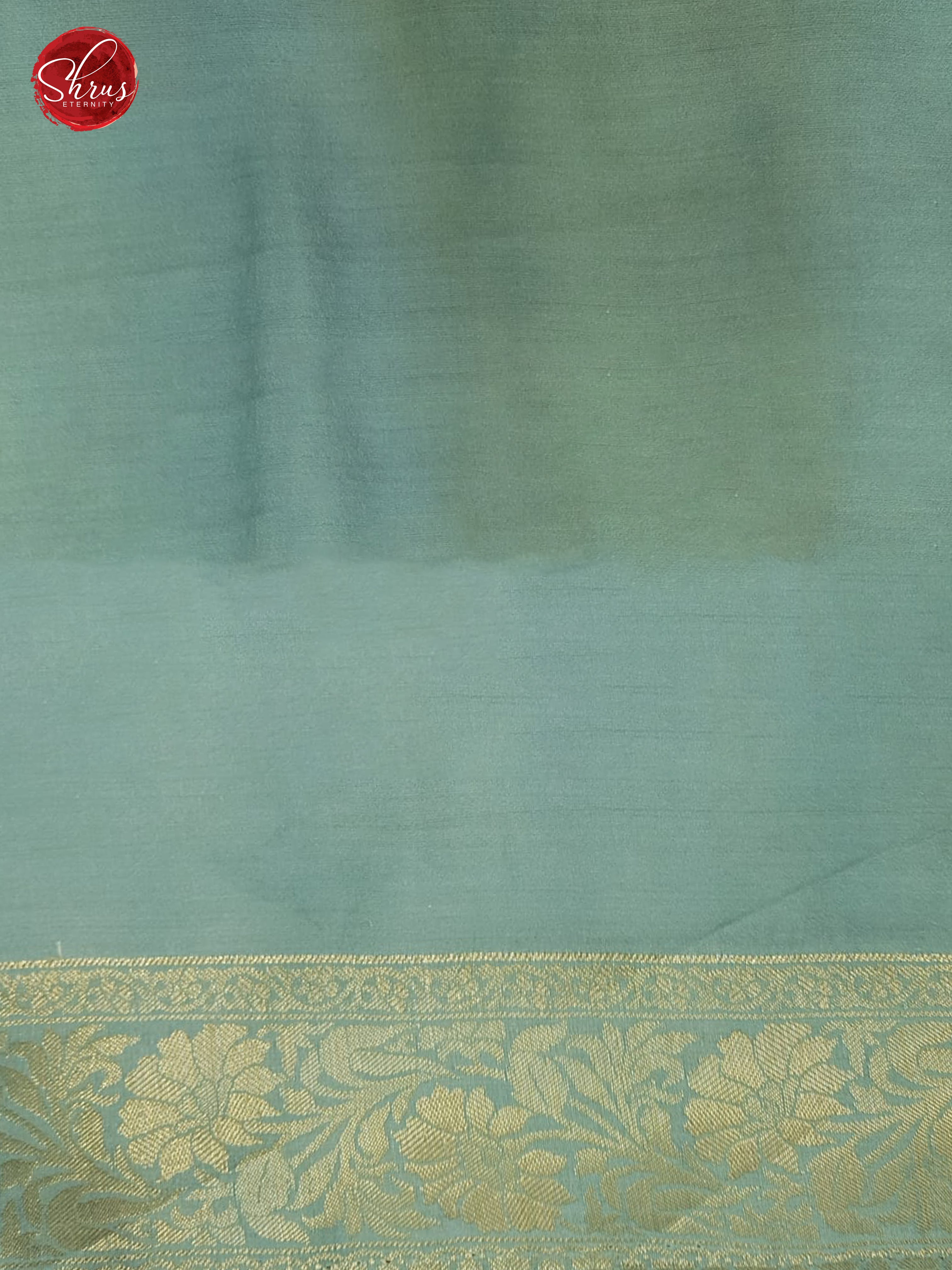 Blue(Single Tone)- Tussar with floral print , zari buttas on the body& Zari Border - Shop on ShrusEternity.com
