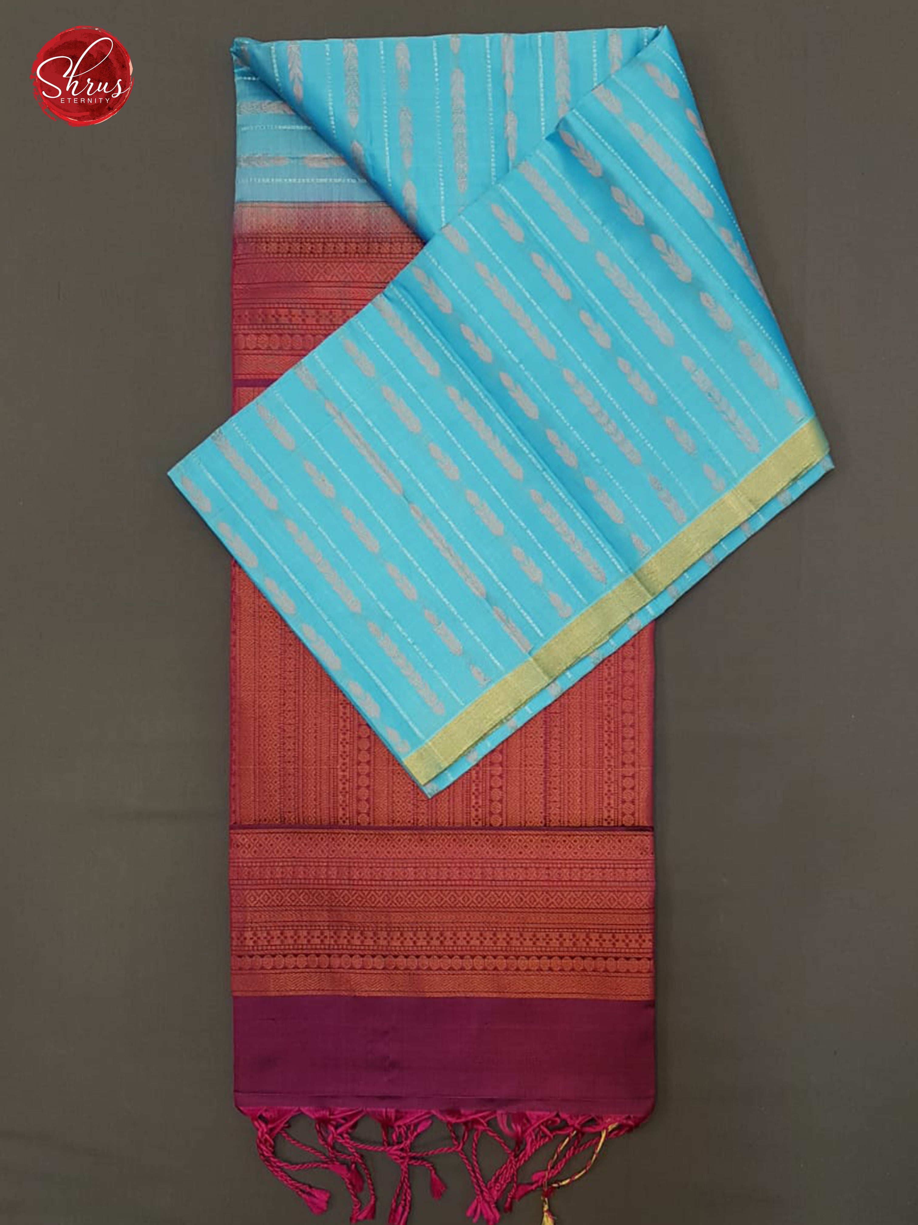 Blue & Majenta Pink - Borderless  Silk  (half-Pure) with  Zari woven   stripes on the body - Shop on ShrusEternity.com