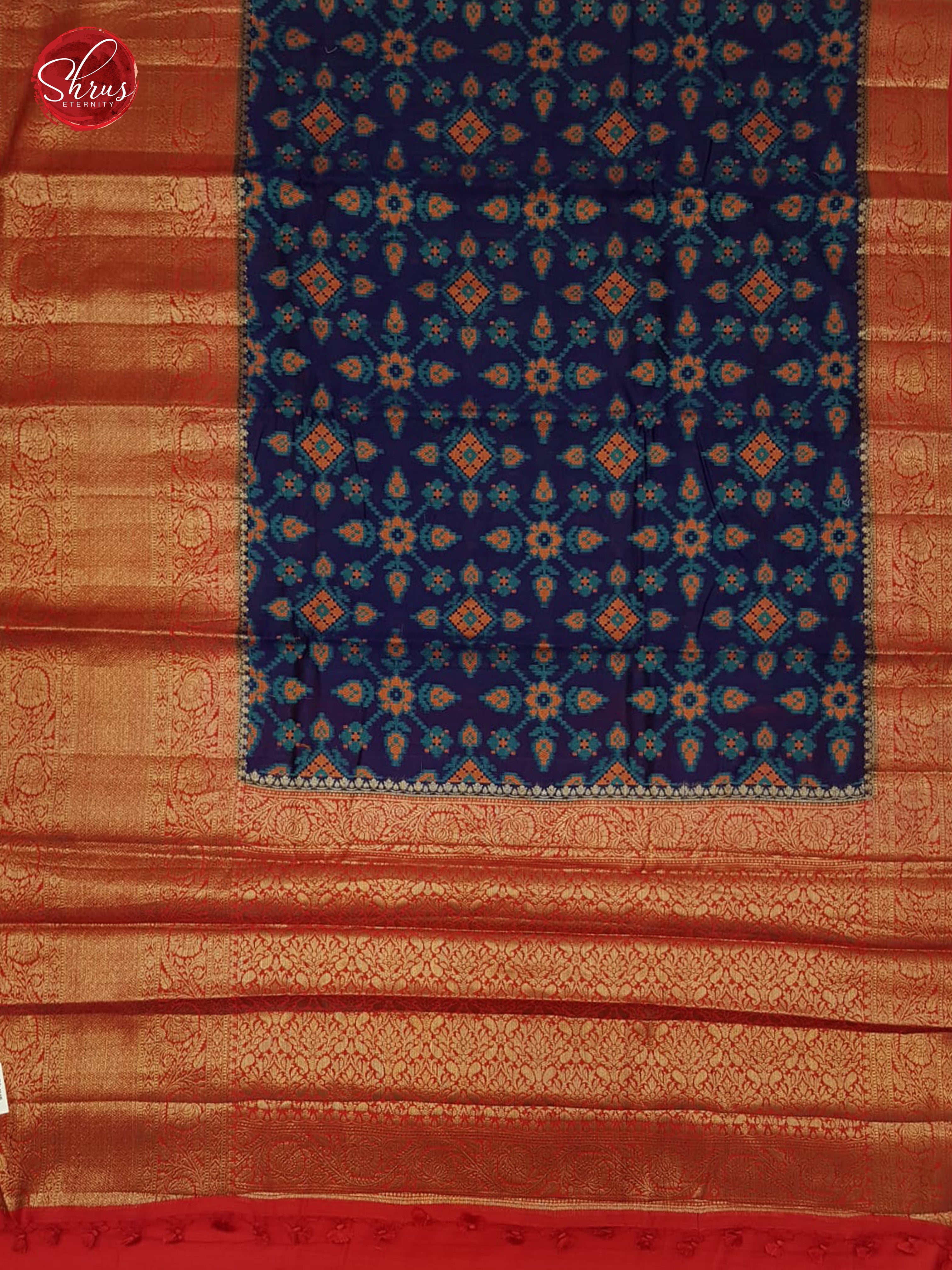 Blue & Red-  Tussar with floral pattern on the body & contrast zari  Border - Shop on ShrusEternity.com