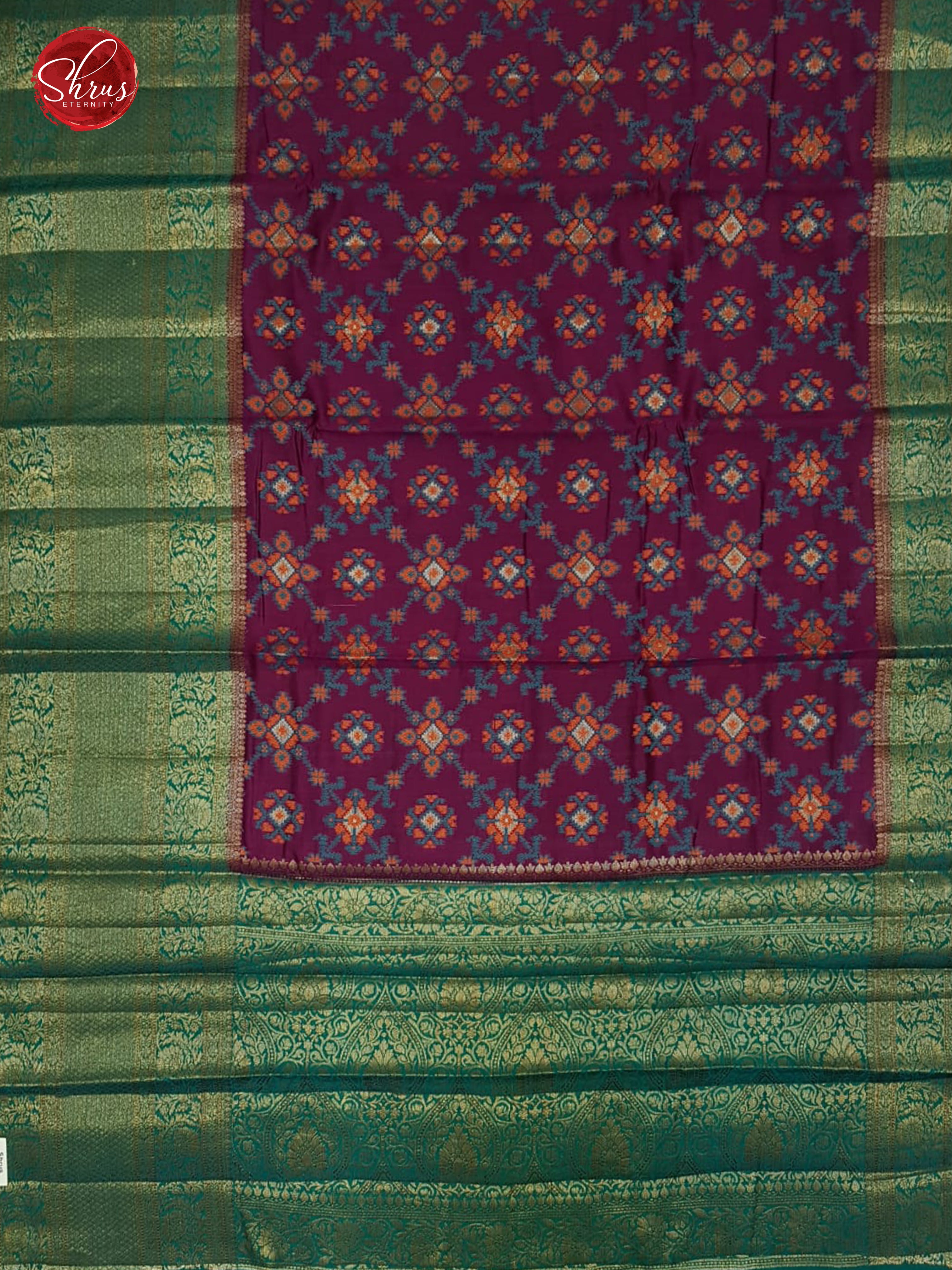 Wine & Green -  Tussar with floral pattern on the body & contrast zari  Border - Shop on ShrusEternity.com