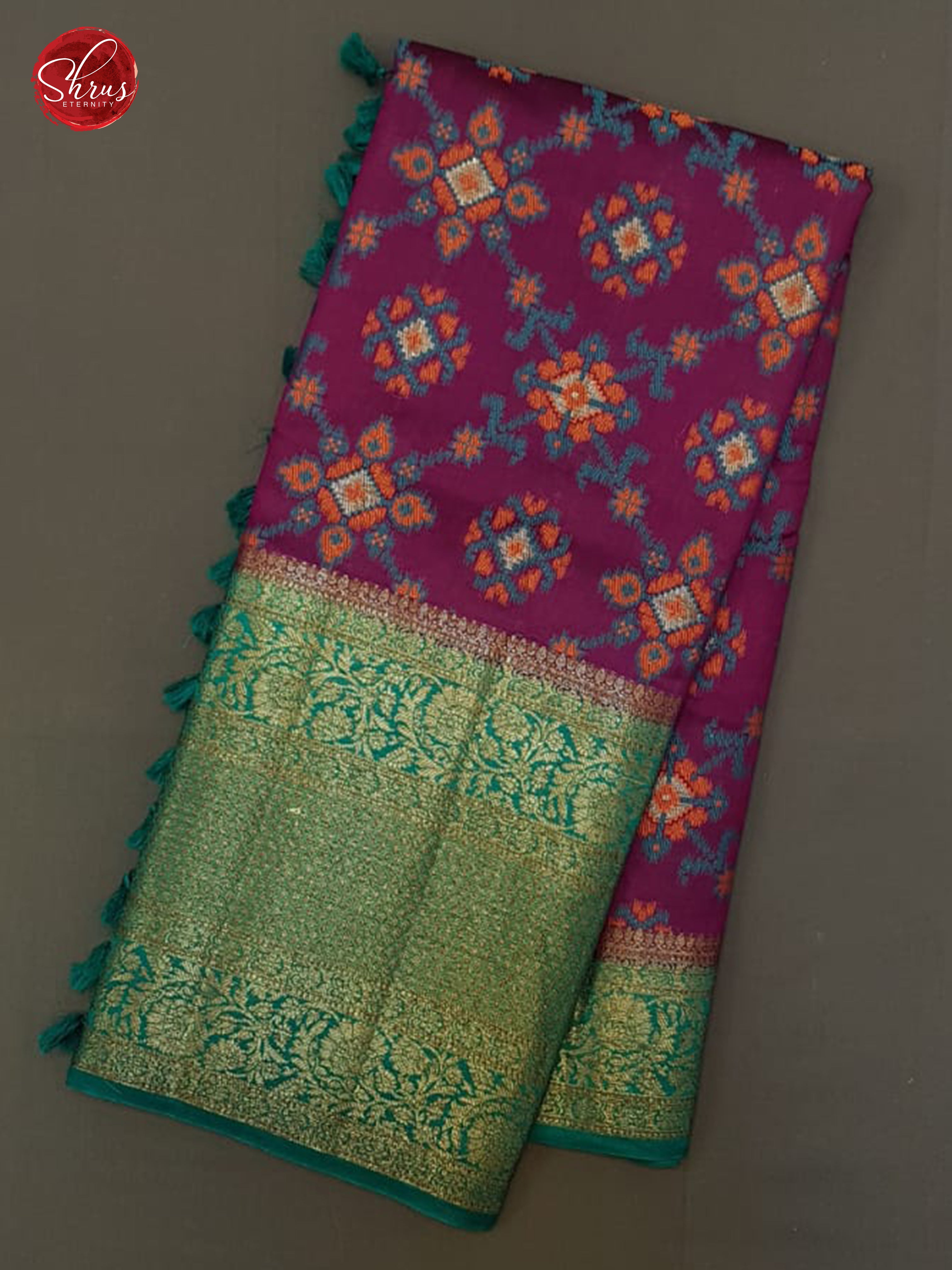 Wine & Green -  Tussar with floral pattern on the body & contrast zari  Border - Shop on ShrusEternity.com