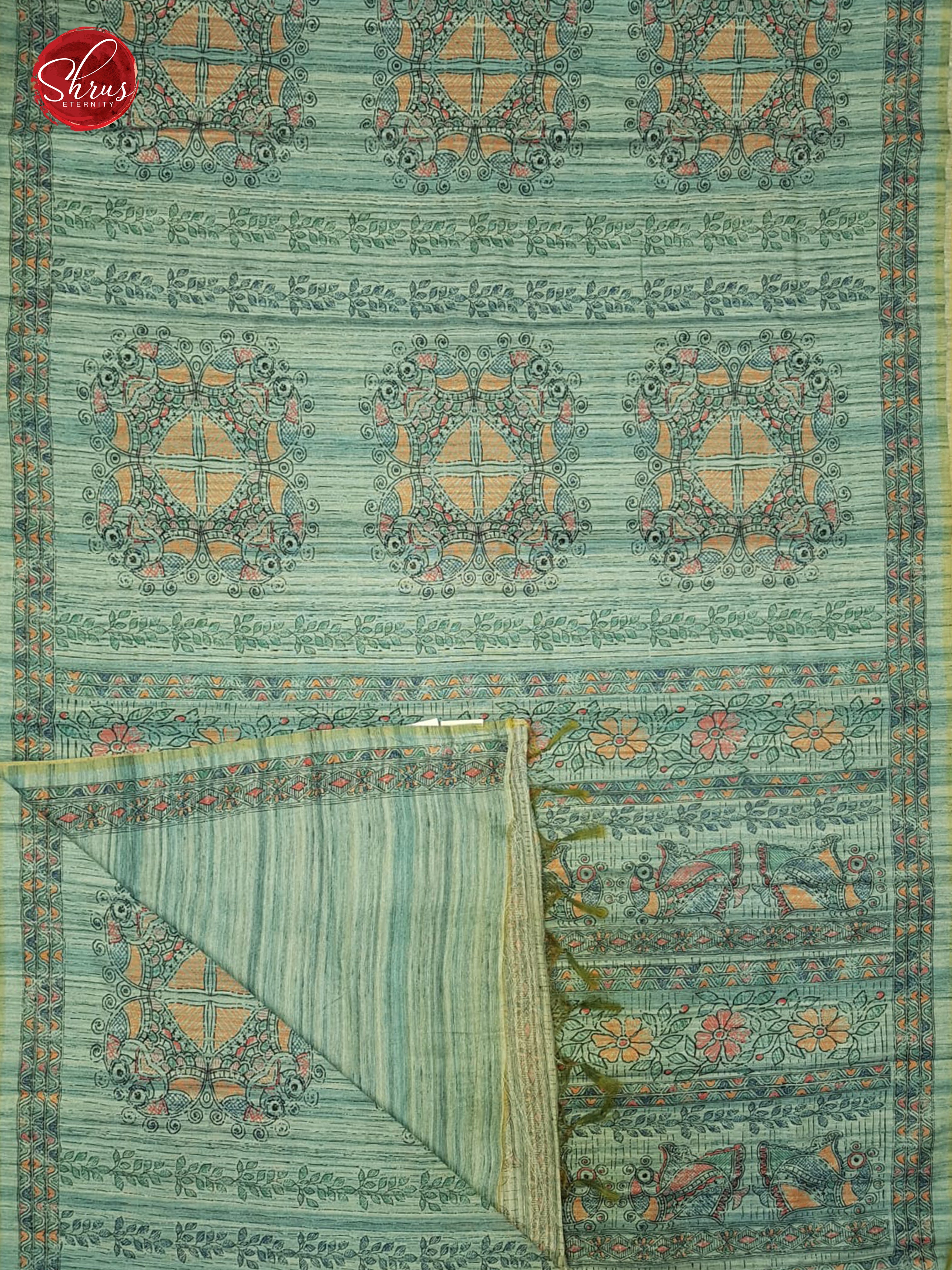 Blue(Single Tone)- Semi Gicha with floral print on the body & Zari Border - Shop on ShrusEternity.com