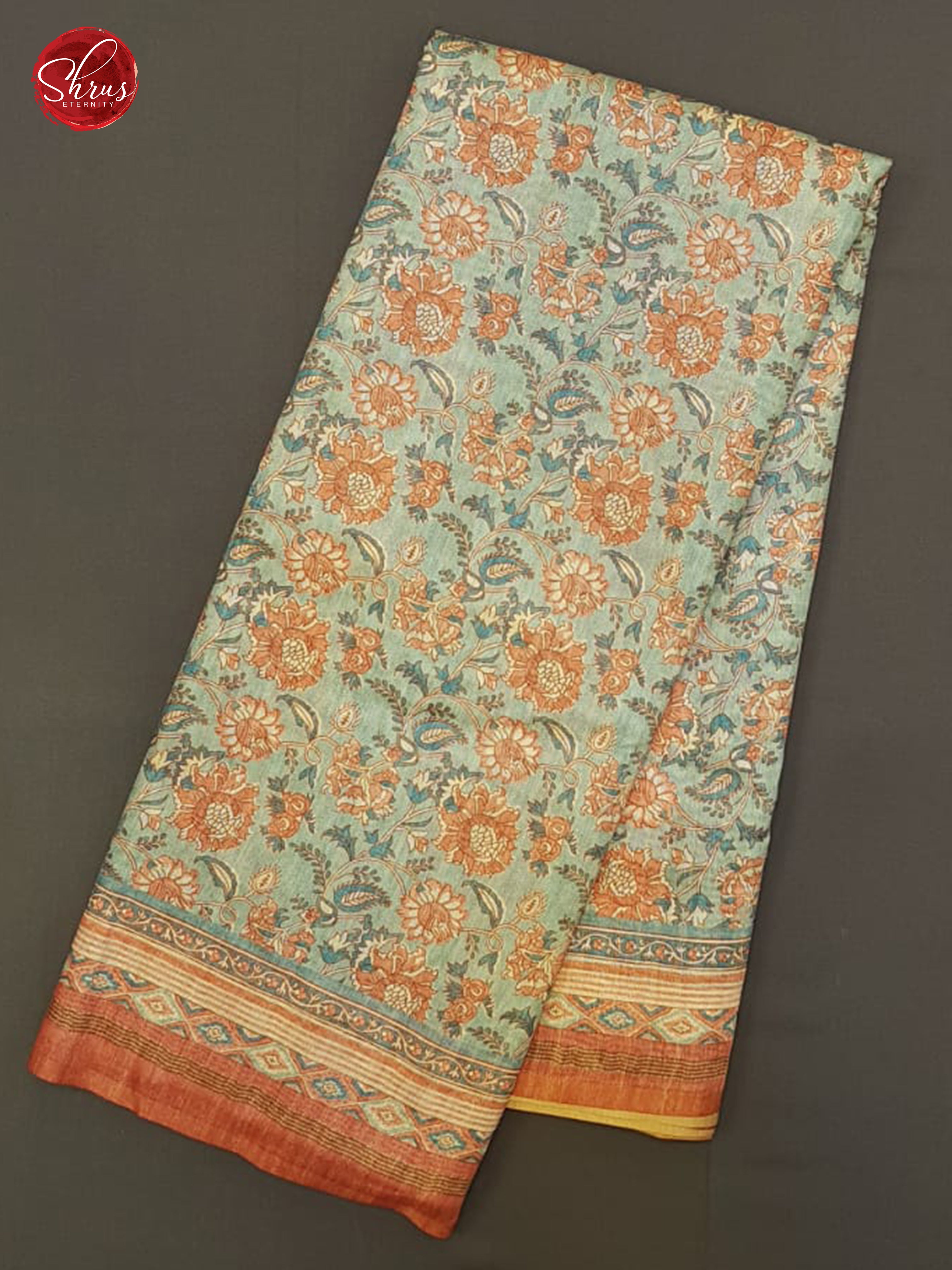 Grey & Orange - Semi Gicha with floral print on the body & Zari Border - Shop on ShrusEternity.com