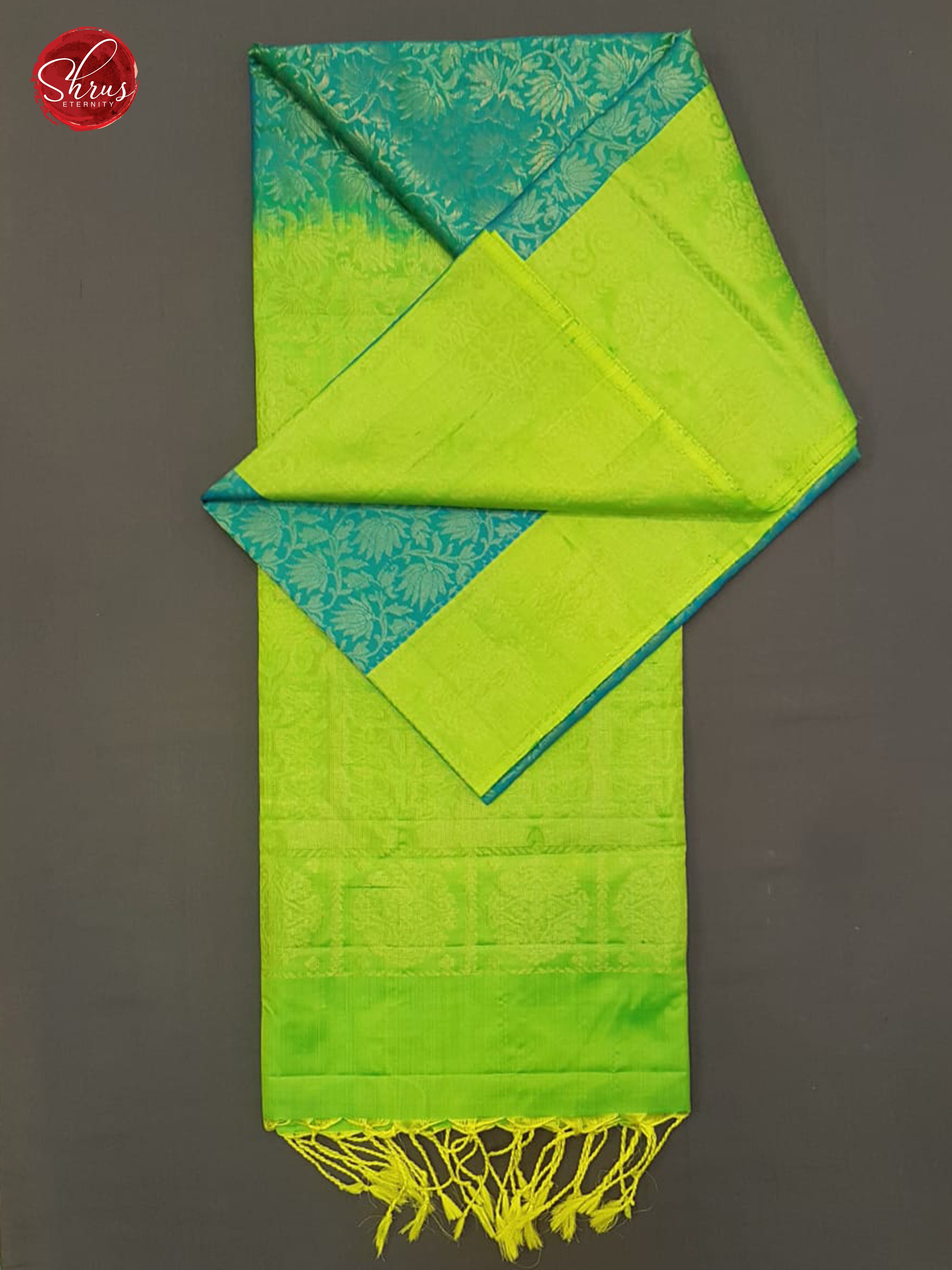 Blue & Green- Soft Silk with zari woven floral  nestling brocade & Contrast  zari  border - Shop on ShrusEternity.com
