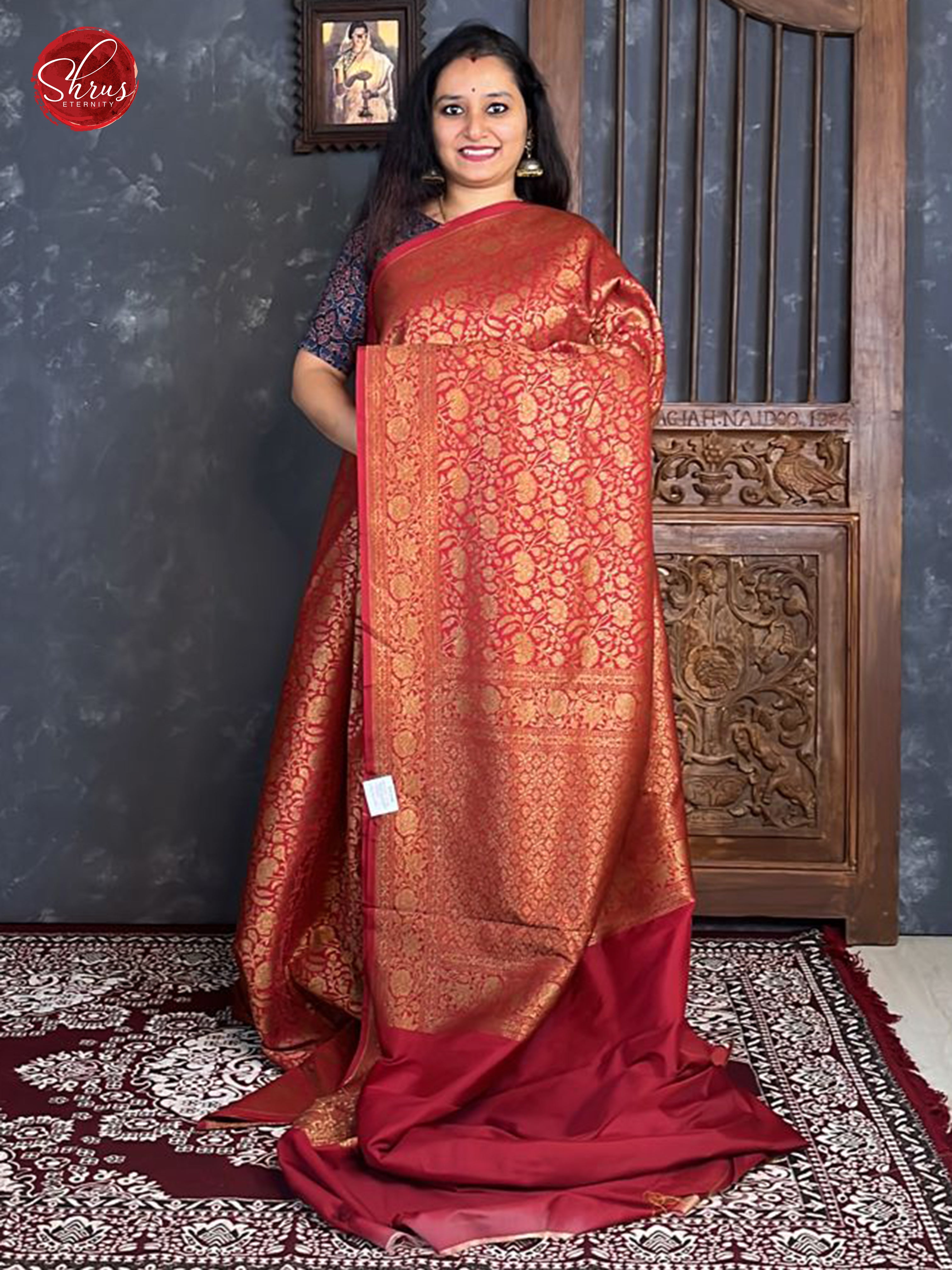 Red (Single Tone)- Semi Banarasi with zari woven floral nestling brocade  on the body &   Zari Border - Shop on ShrusEternity.com