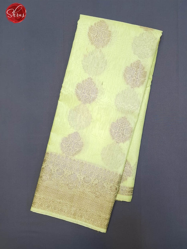 Yellow(Single Tone) - Muslin Silk with Zari woven floral motifs on the body & zari Border - Shop on ShrusEternity.com