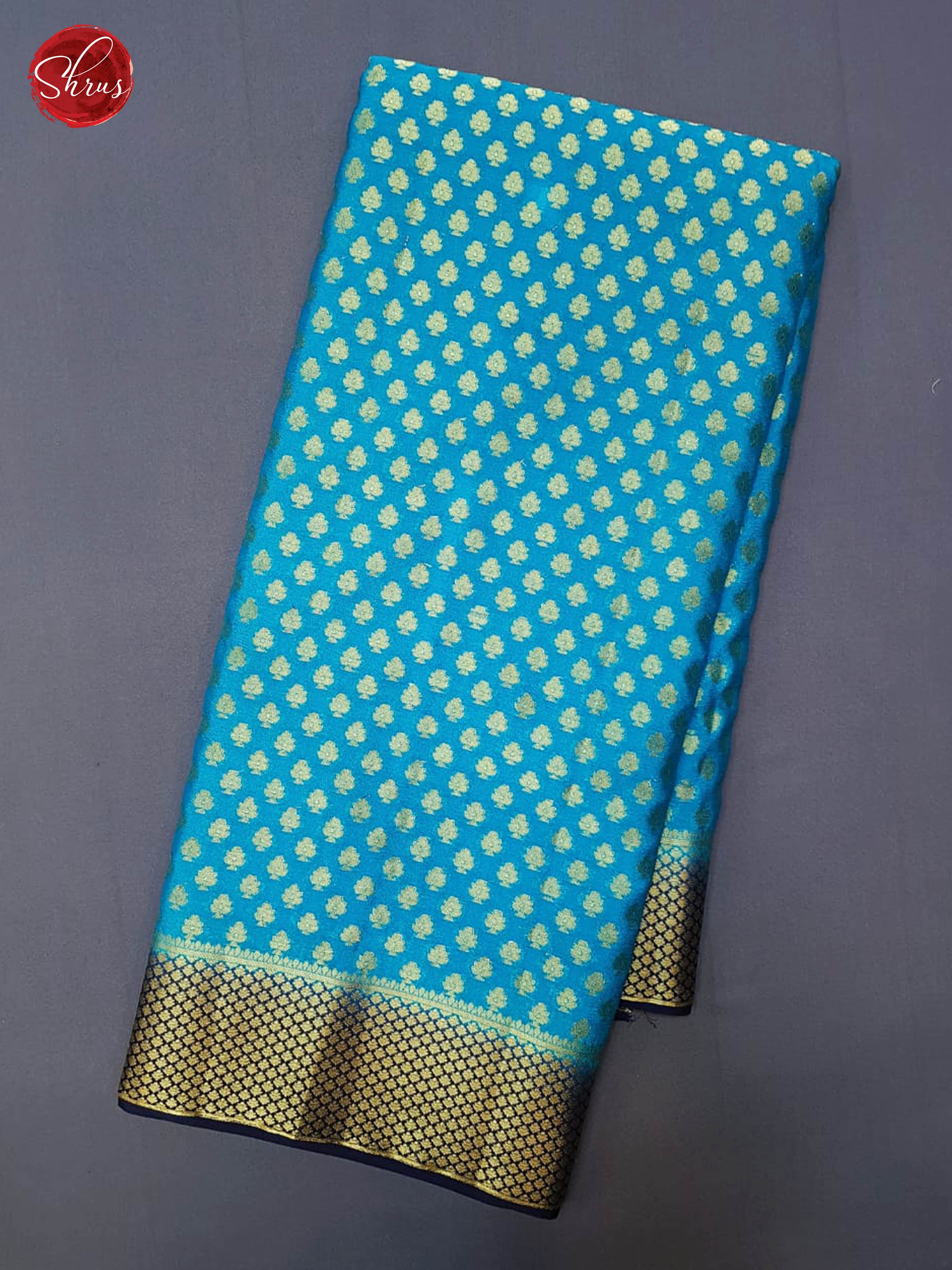 German Blue & Blue - Semi Chiffon with Zari woven buttas on the body & Contrast Zari Border - Shop on ShrusEternity.com